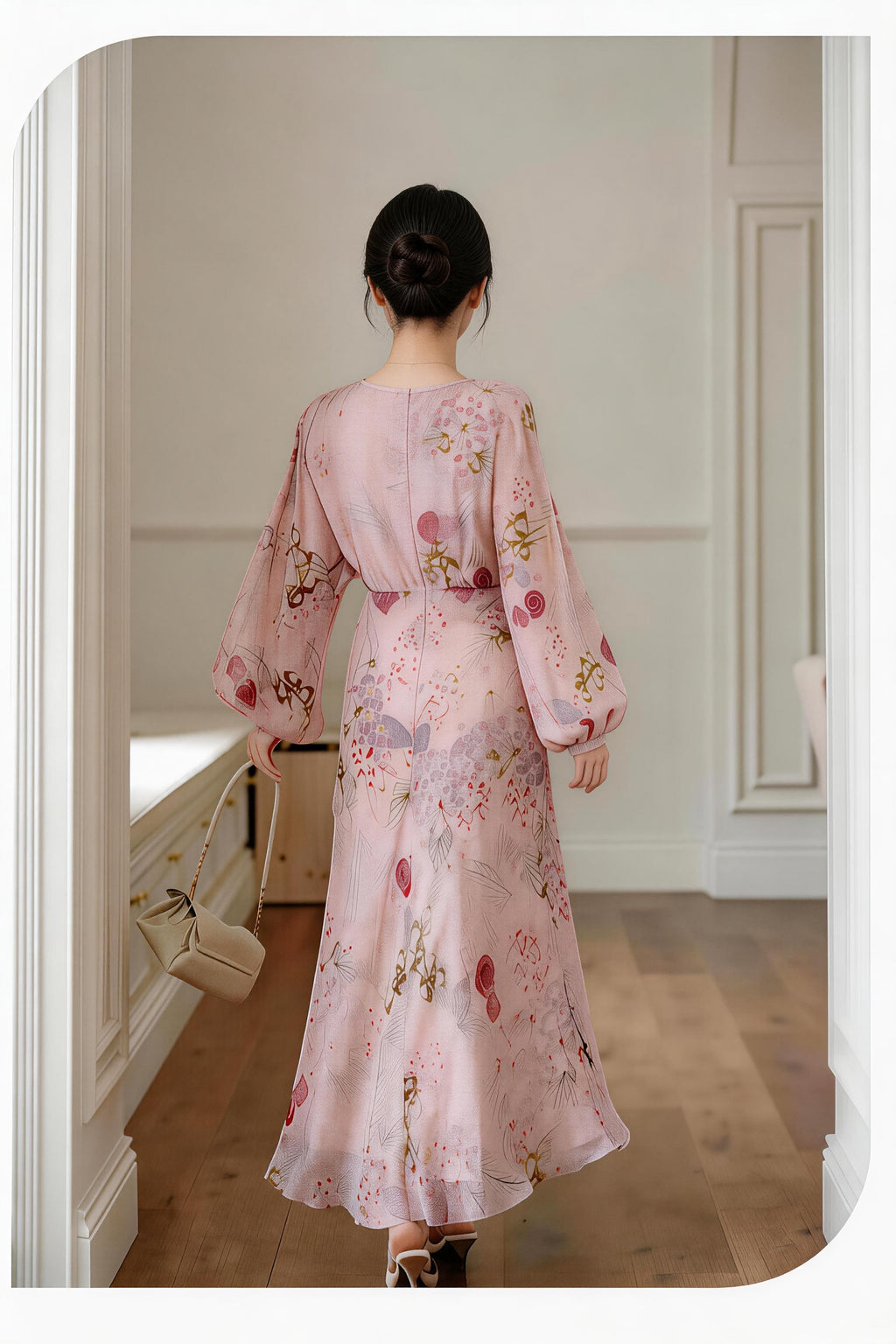 Model wearing pink floral print chiffon long sleeve v-neck maxi dress