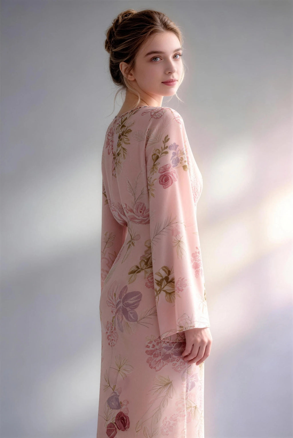 Model wearing pink floral print chiffon long sleeve v-neck maxi dress