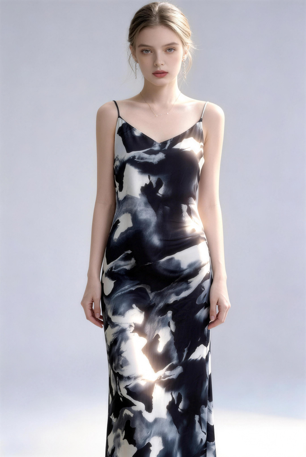 Model wearing black new chinese style lotus print spaghetti strap maxi dress