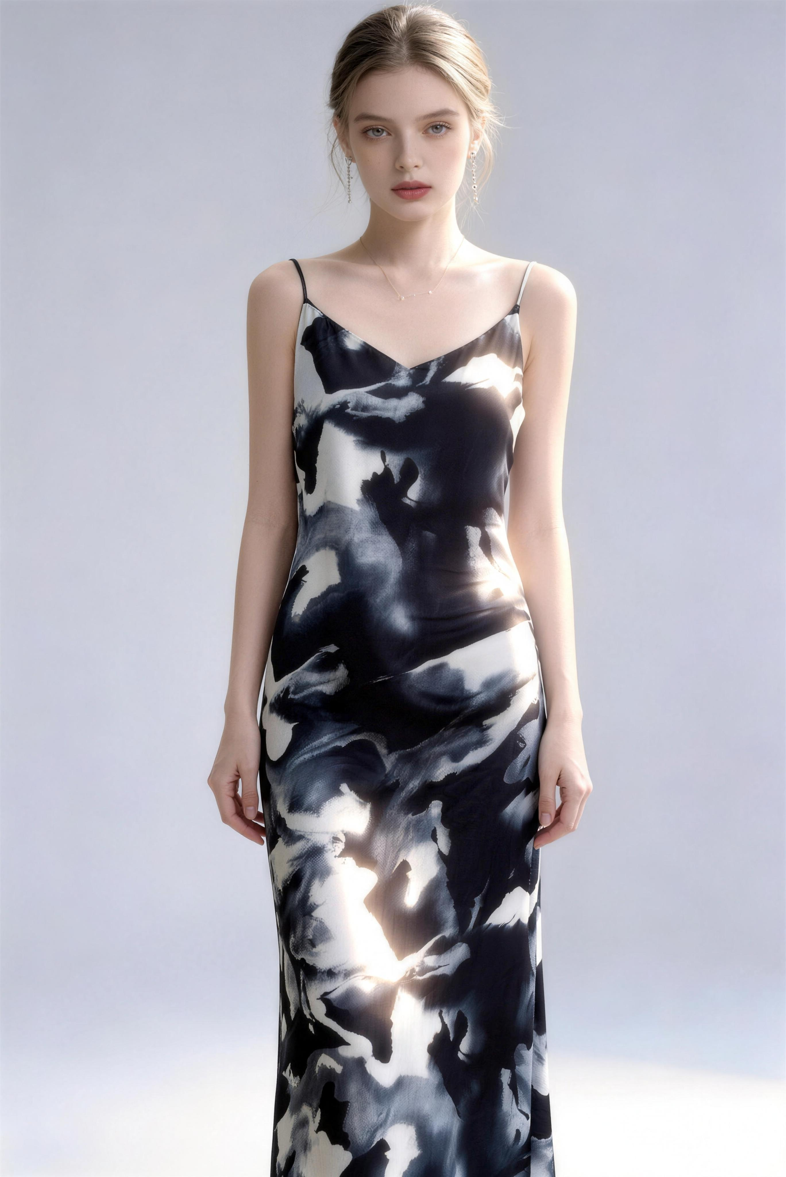Model wearing black new chinese style lotus print spaghetti strap maxi dress