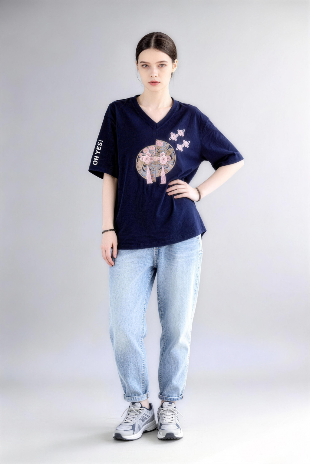 Model wearing blue new chinese style v-neck printed tassel short-sleeve t-shirt
