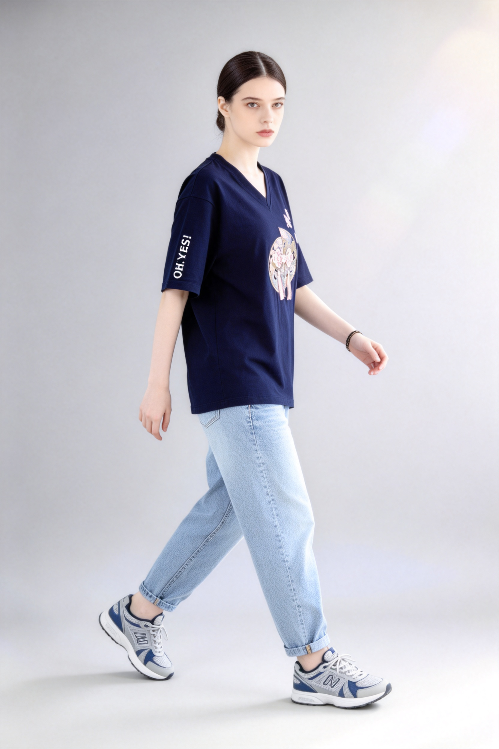 Model wearing blue new chinese style v-neck printed tassel short-sleeve t-shirt