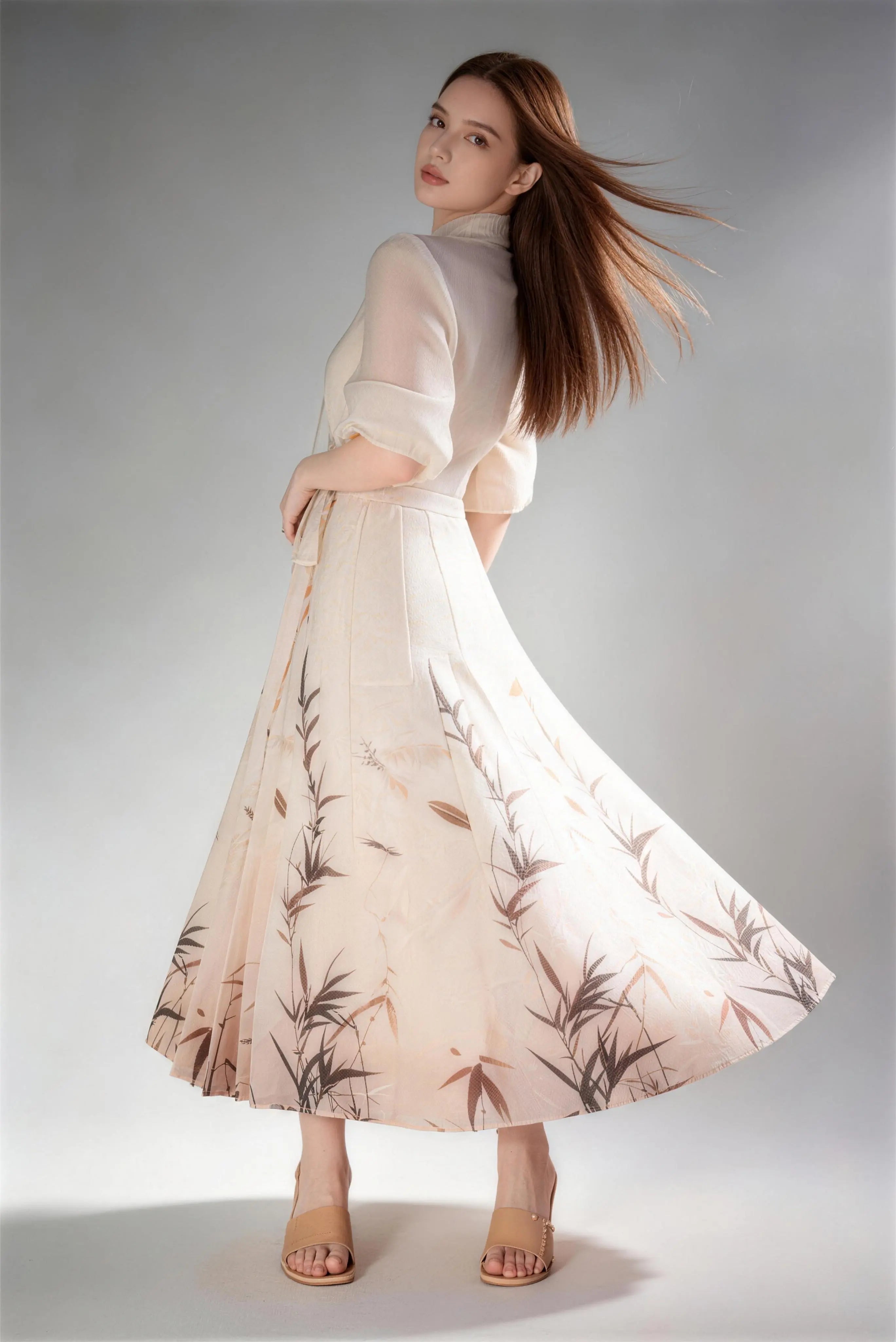 Model wearing beige new chinese style ink bamboo print collared waist tie midi dress