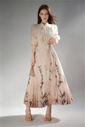 Model wearing new chinese style ink bamboo print collared waist tie midi dress