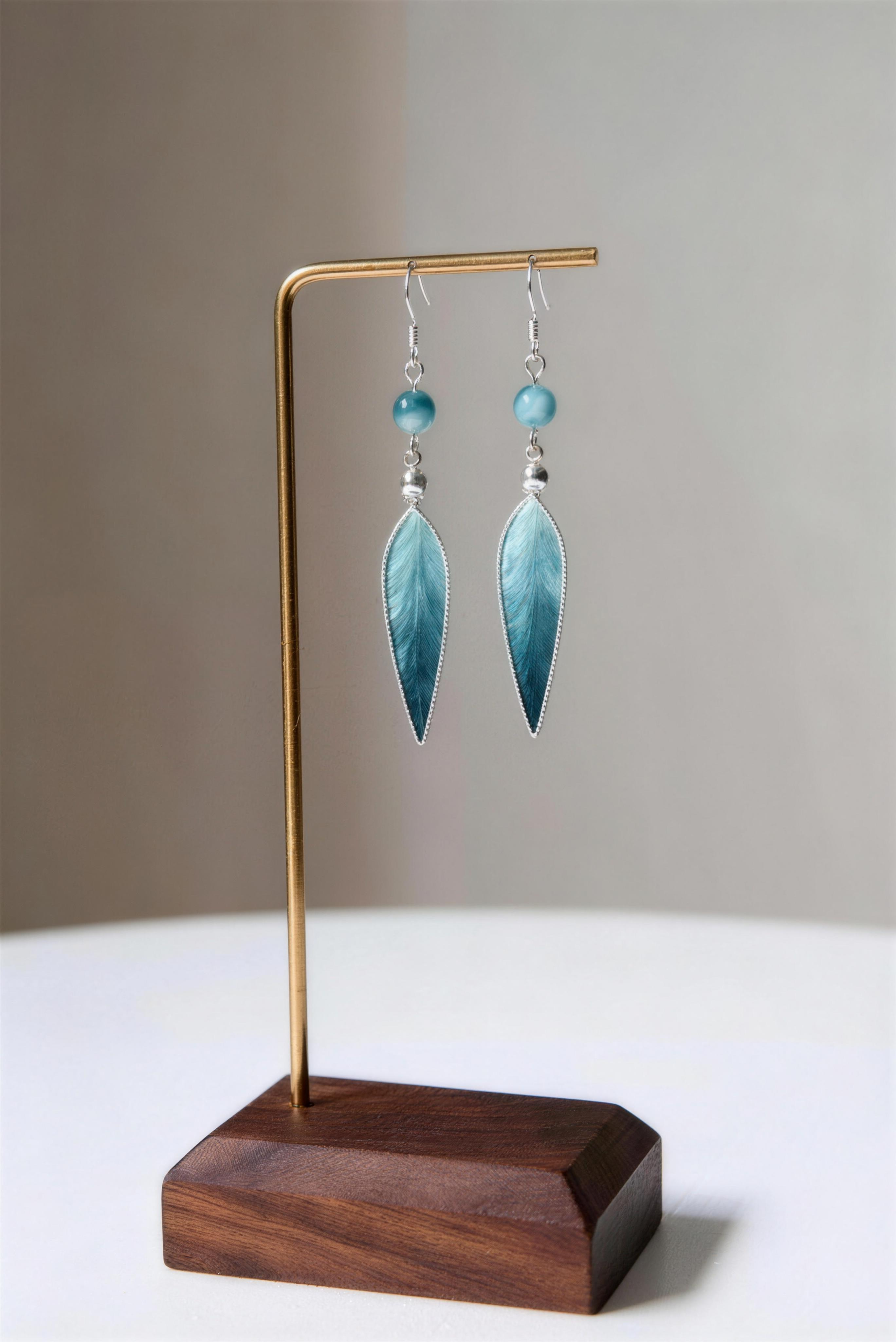 Model wearing blue jiangnan intangible cultural heritage ronghua bamboo leaf earrings