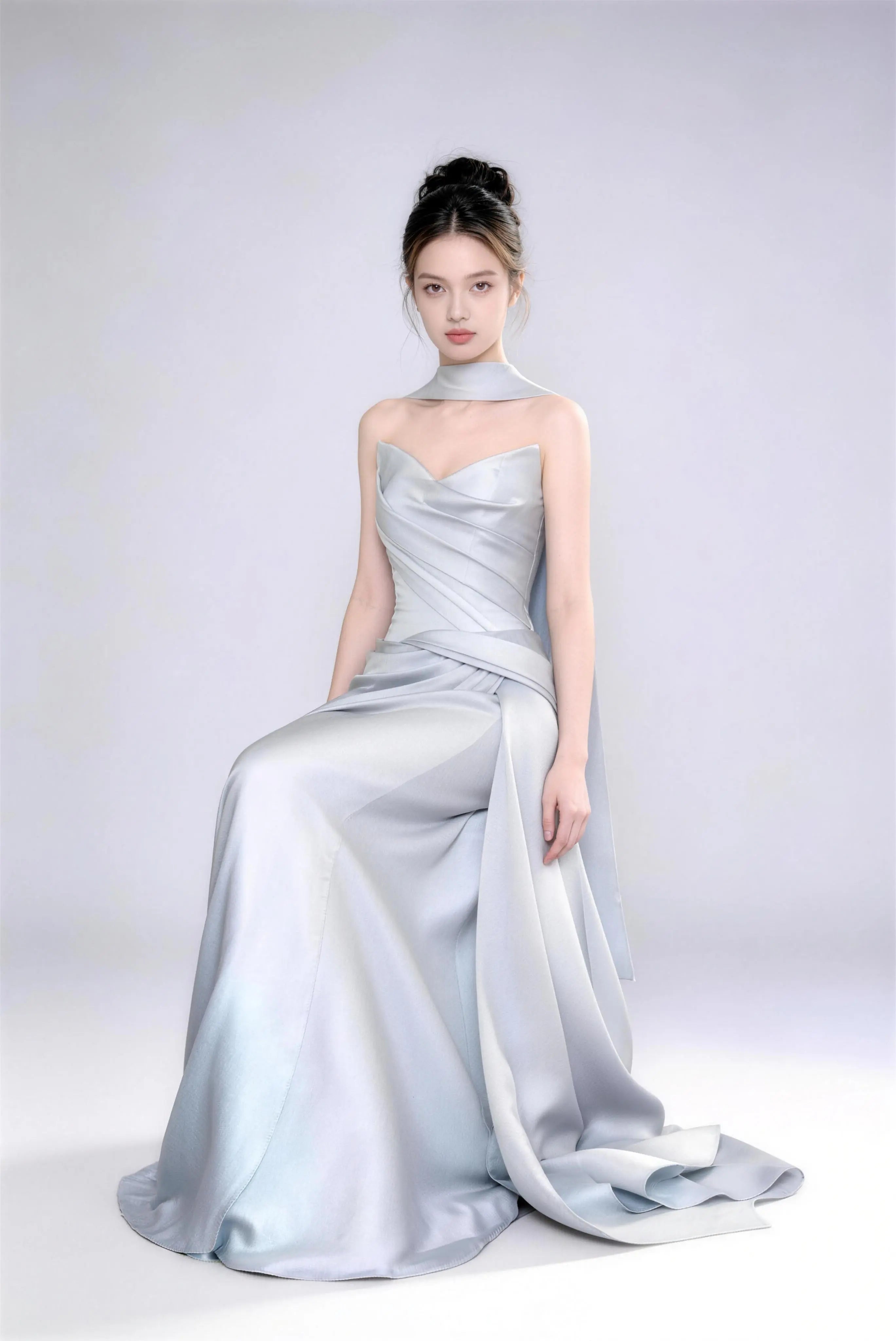 Model wearing Phoehua premium ice blue satin mermaid gown, minimalist studio shot highlighting luxurious fabric texture, graceful posture and sophisticated design.