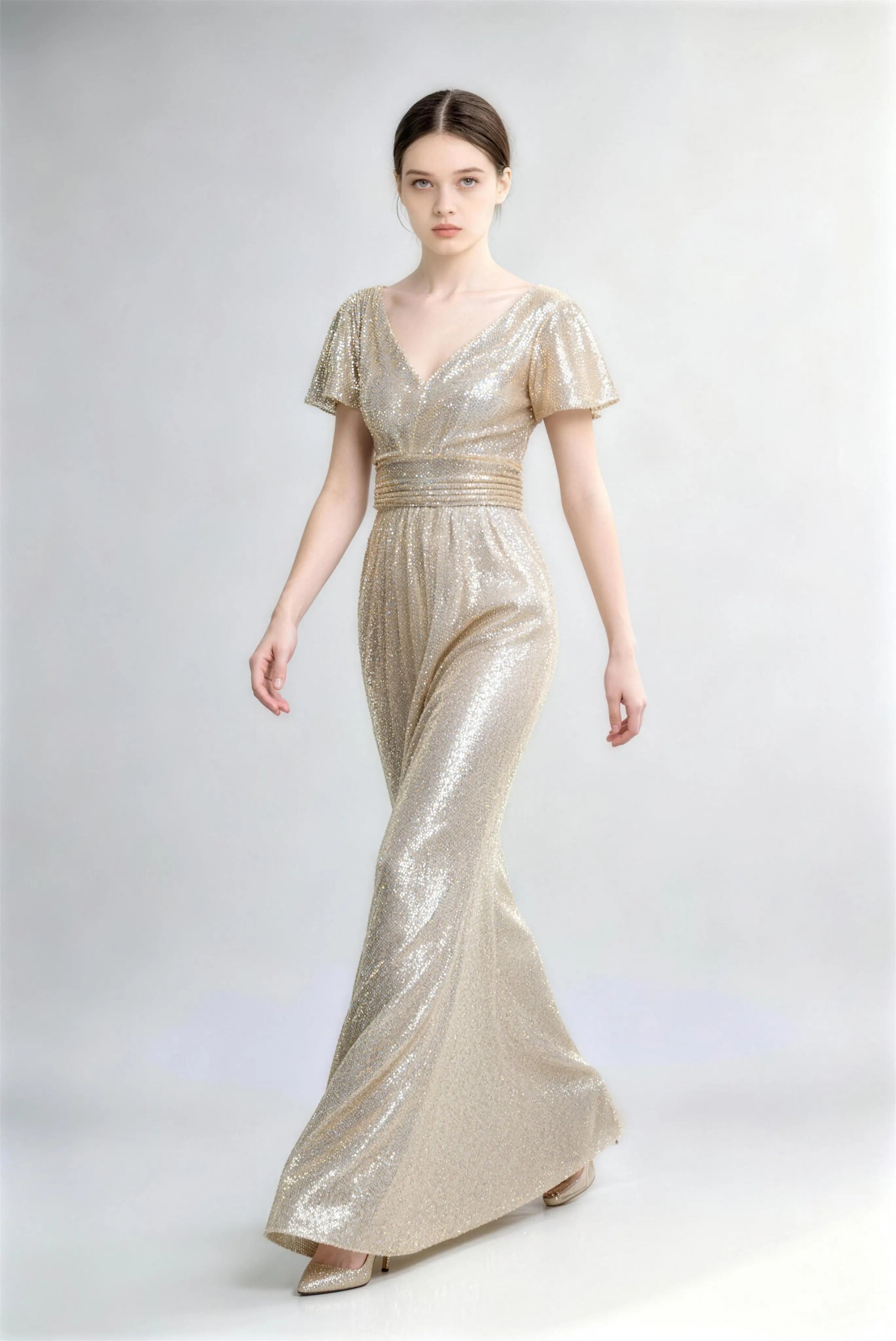 Pjoehua Walking Pose of Champagne Sequin Evening Dress, Flowing Skirt V-Neck Flutter Sleeve Pleated Waist Formal Gala Gown
