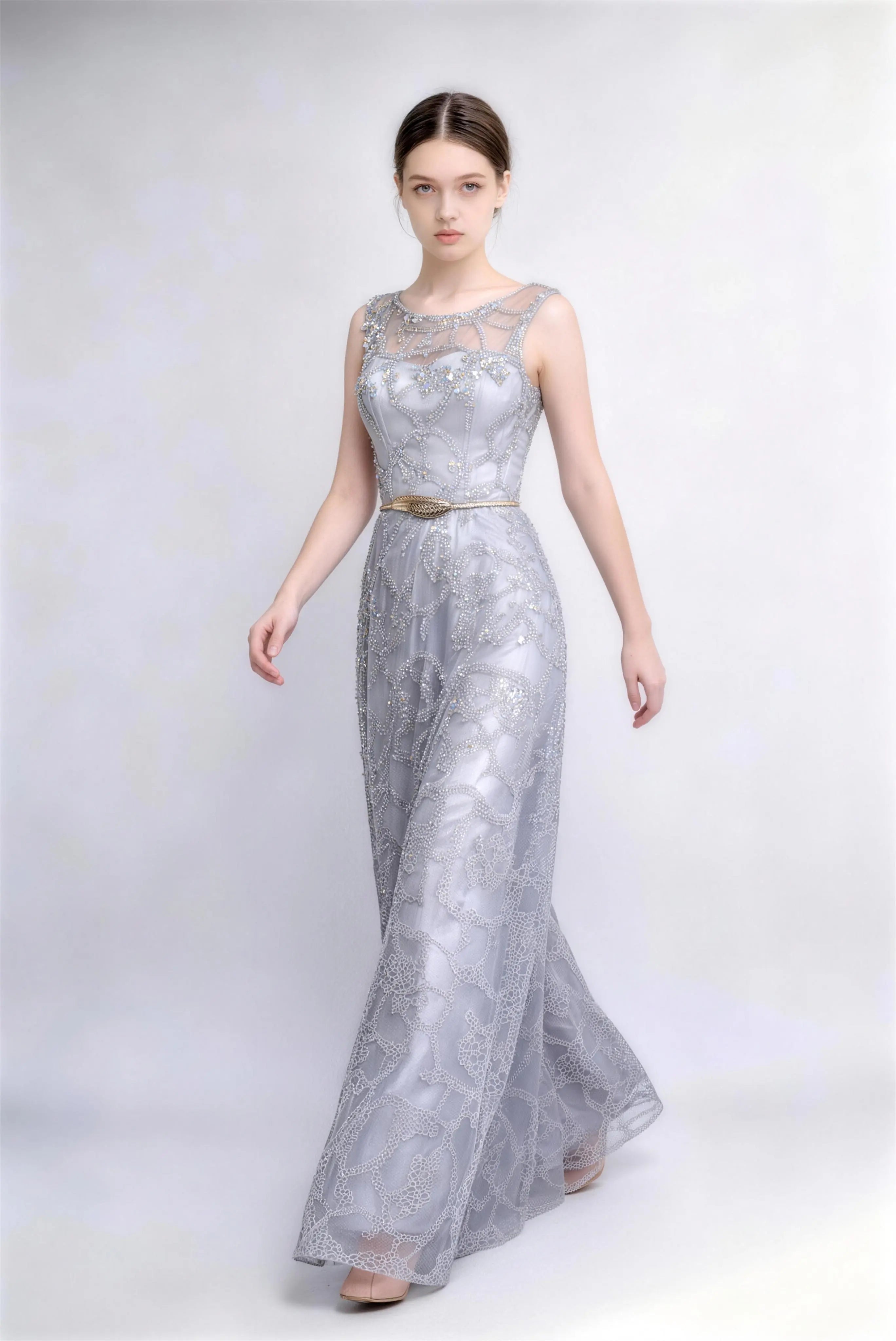 Phoehua Walking Pose of Silver Beaded Lace Evening Gown, Flowing A-Line Skirt Illusion Neck Gold Belt Formal Dress