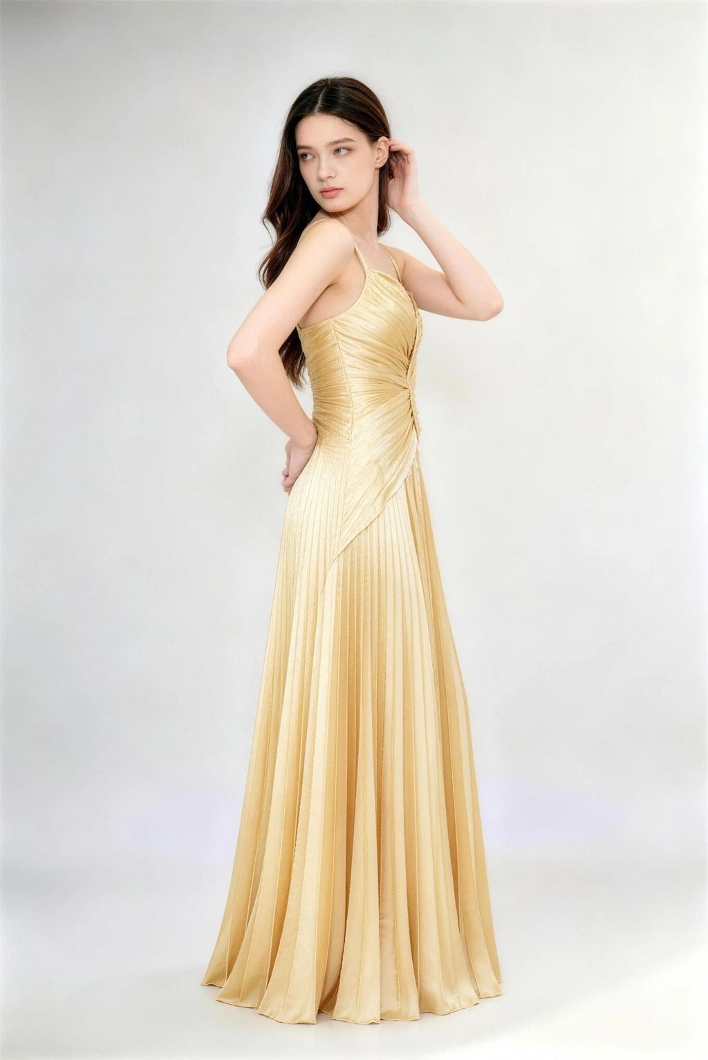 Phoehua Dynamic Pose of Golden Pleated Satin Evening Gown, Vertical Pleats Cross-Back Spaghetti Straps High Waist A-Line Formal Dress
