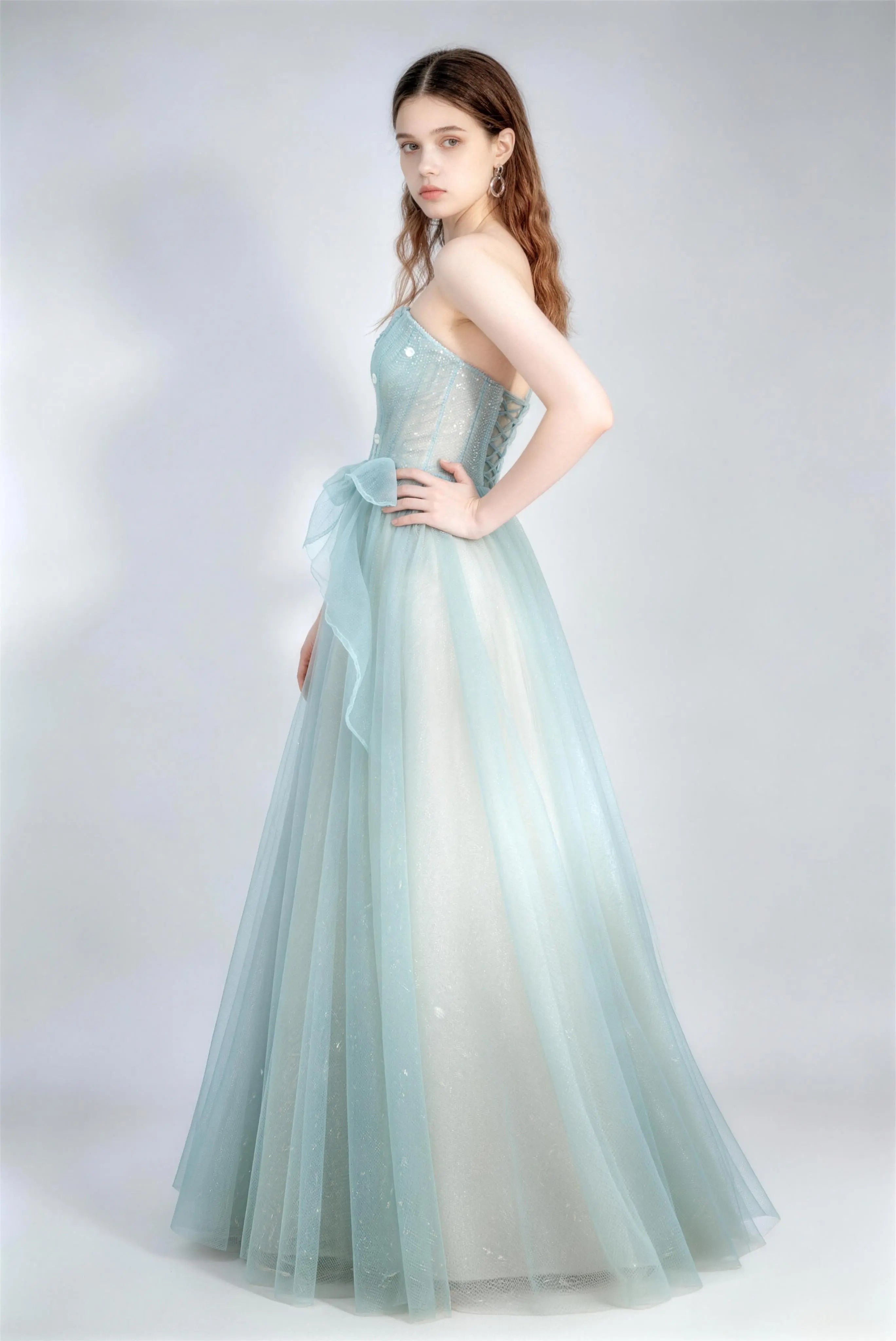 Phoehua Three-Quarter View of Light Blue Glitter Tulle Ball Gown, Corset Bodice Lace-Up Back High Waist Floor-Length Prom Dress
