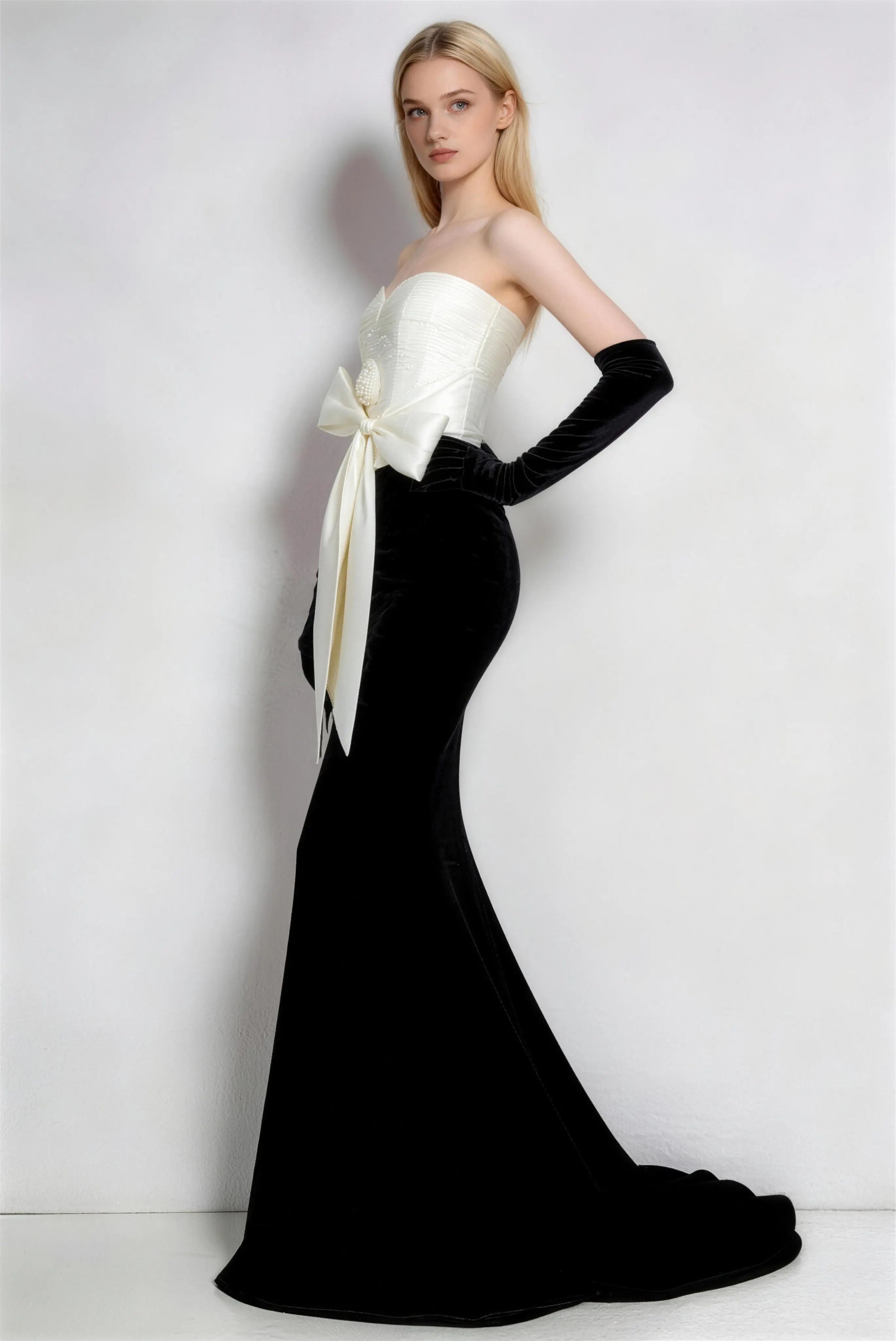 Phoehua Three‑Quarter View of Black White Velvet Mermaid Evening Dress, Sweetheart Strapless Corset Satin Bow Formal Gown