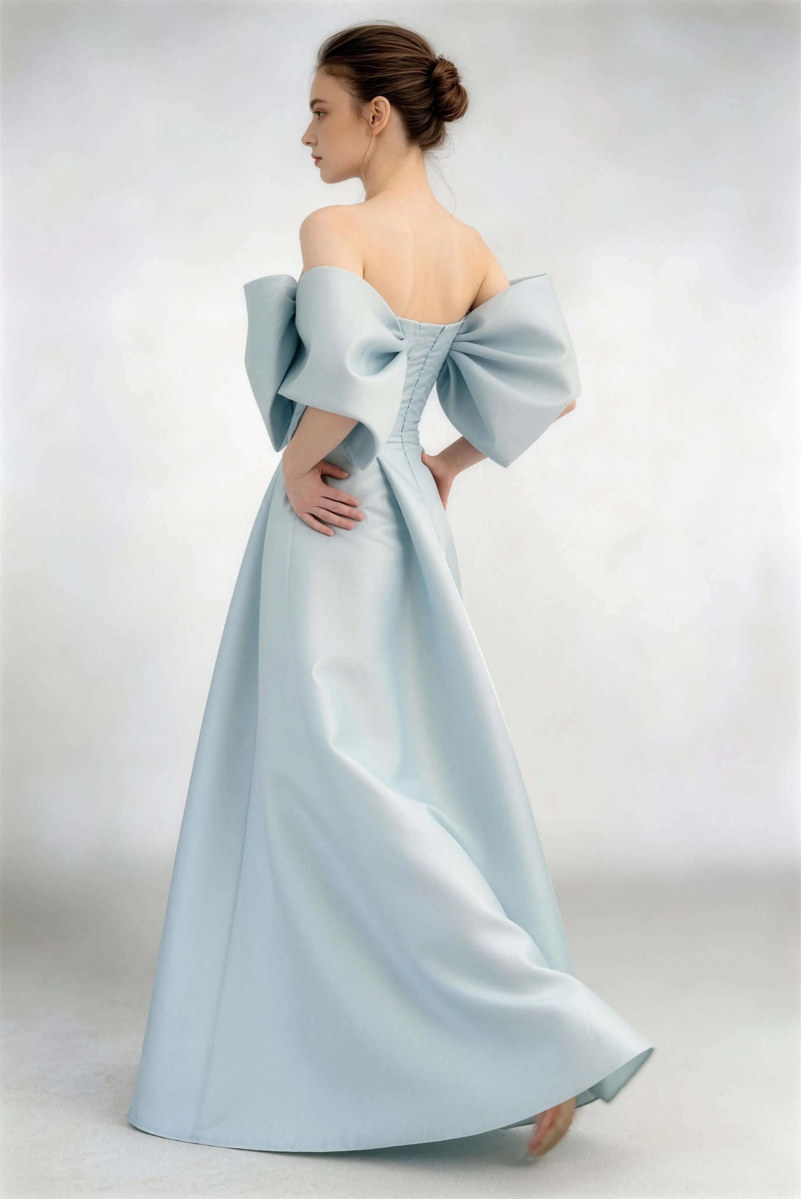 Phoehua Walking Pose of Sky Blue Off‑Shoulder Satin Dress, Flowing A‑Line Skirt Oversized Bow Elegant Formal Evening Gown