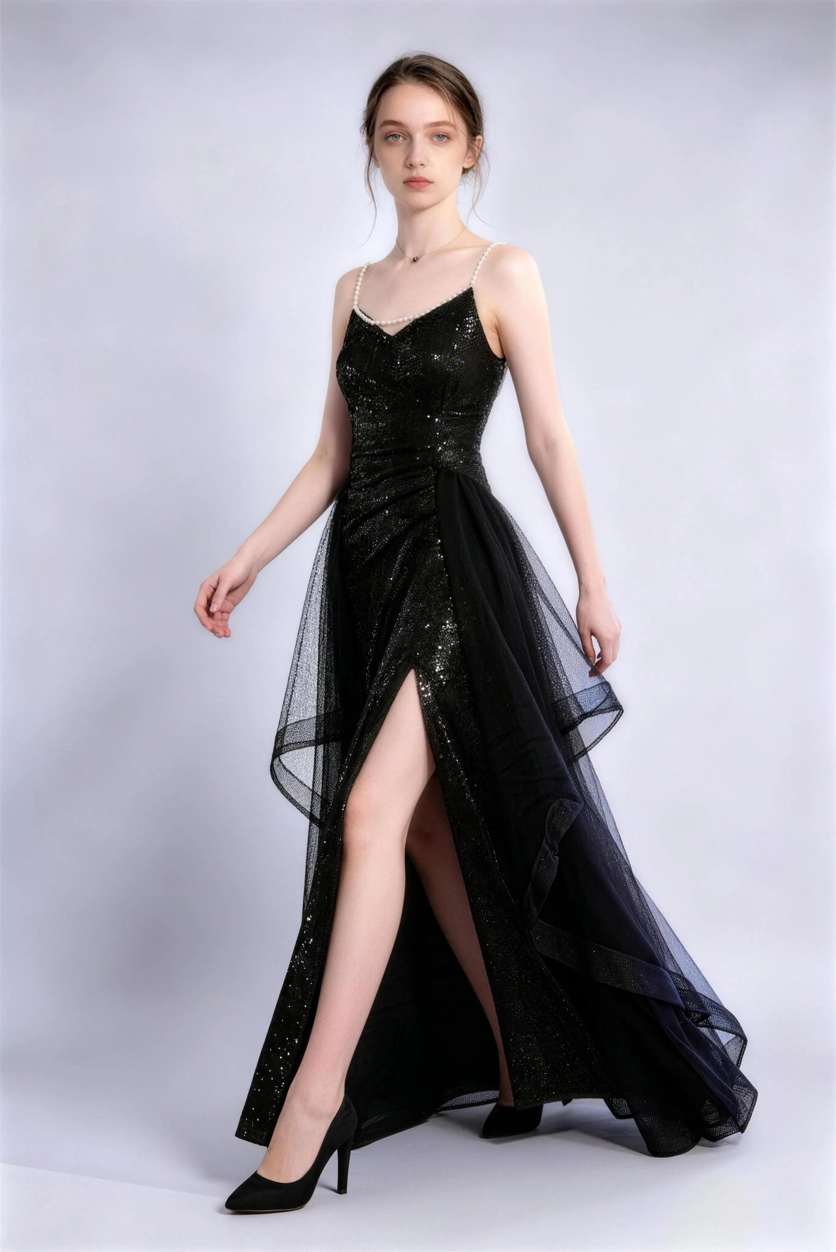 Phoehua Walking Pose of Black Sequin Pearl Strap Tulle Evening Gown, High‑Waist High Slit Glamorous Formal Party Long Dress