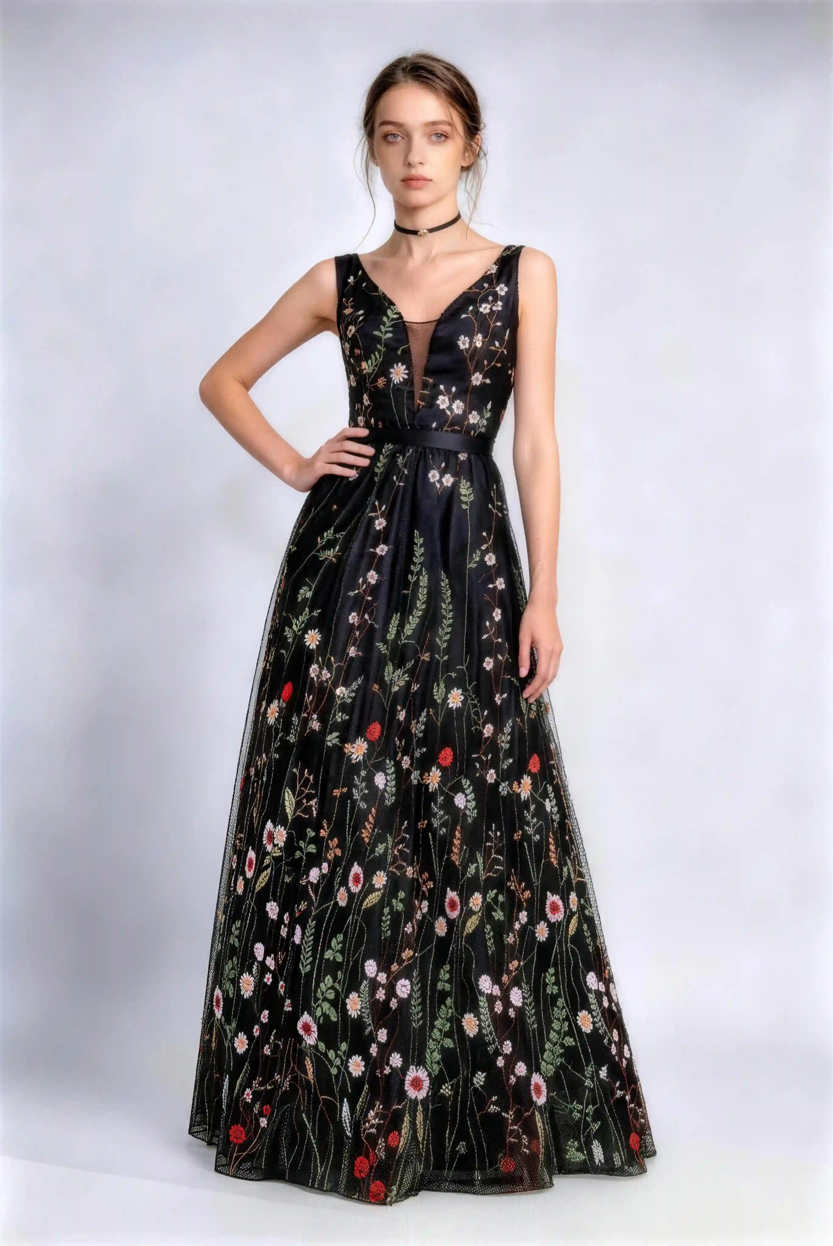 Model wearing 3d floral embroidered tulle v‑neck long formal evening gown