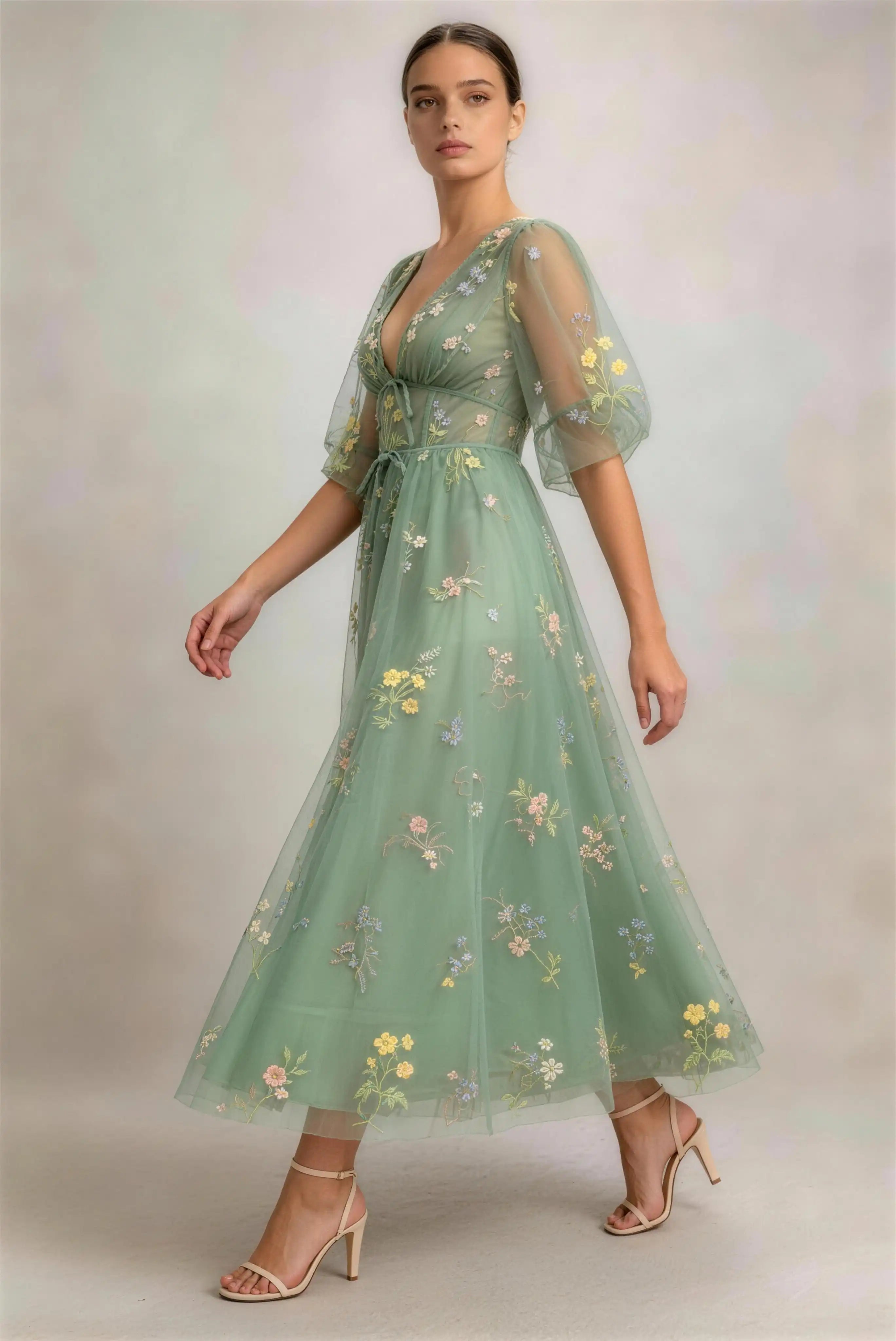 Phoehua Walking Pose of Sage Green Deep‑V‑Neck Midi Dress, Puff Sleeve Floral Embroidered A‑Line Romantic Wedding Guest Formal Party Gown