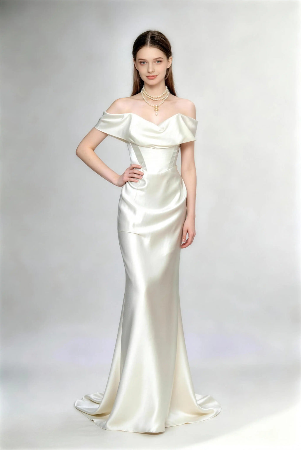 Phoehua Front Pose of Ivory White Off‑Shoulder Satin Mermaid Bridal Gown, Corset Waist Draped Cowl Neck Open‑Back Formal Wedding Dress