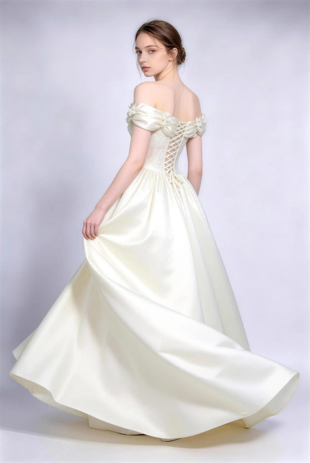 Phoehua Twirl Pose of Cream White Luxury Formal Evening Ball Gown, Off‑Shoulder Puff‑Cuff Beaded‑Floral Applique Corset Lace‑Up Bridal Dress