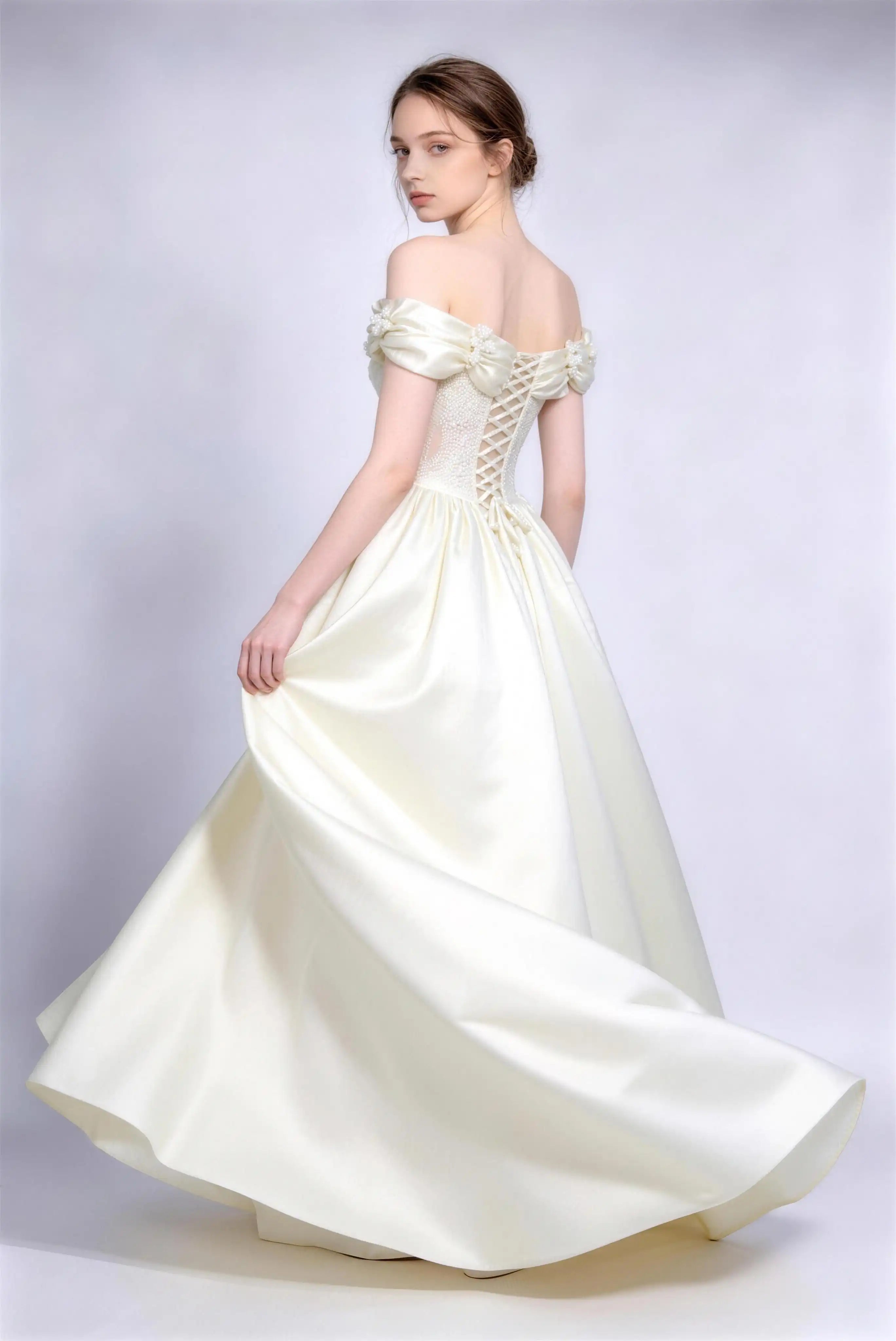 Phoehua Twirl Pose of Cream White Luxury Formal Evening Ball Gown, Off‑Shoulder Puff‑Cuff Beaded‑Floral Applique Corset Lace‑Up Bridal Dress