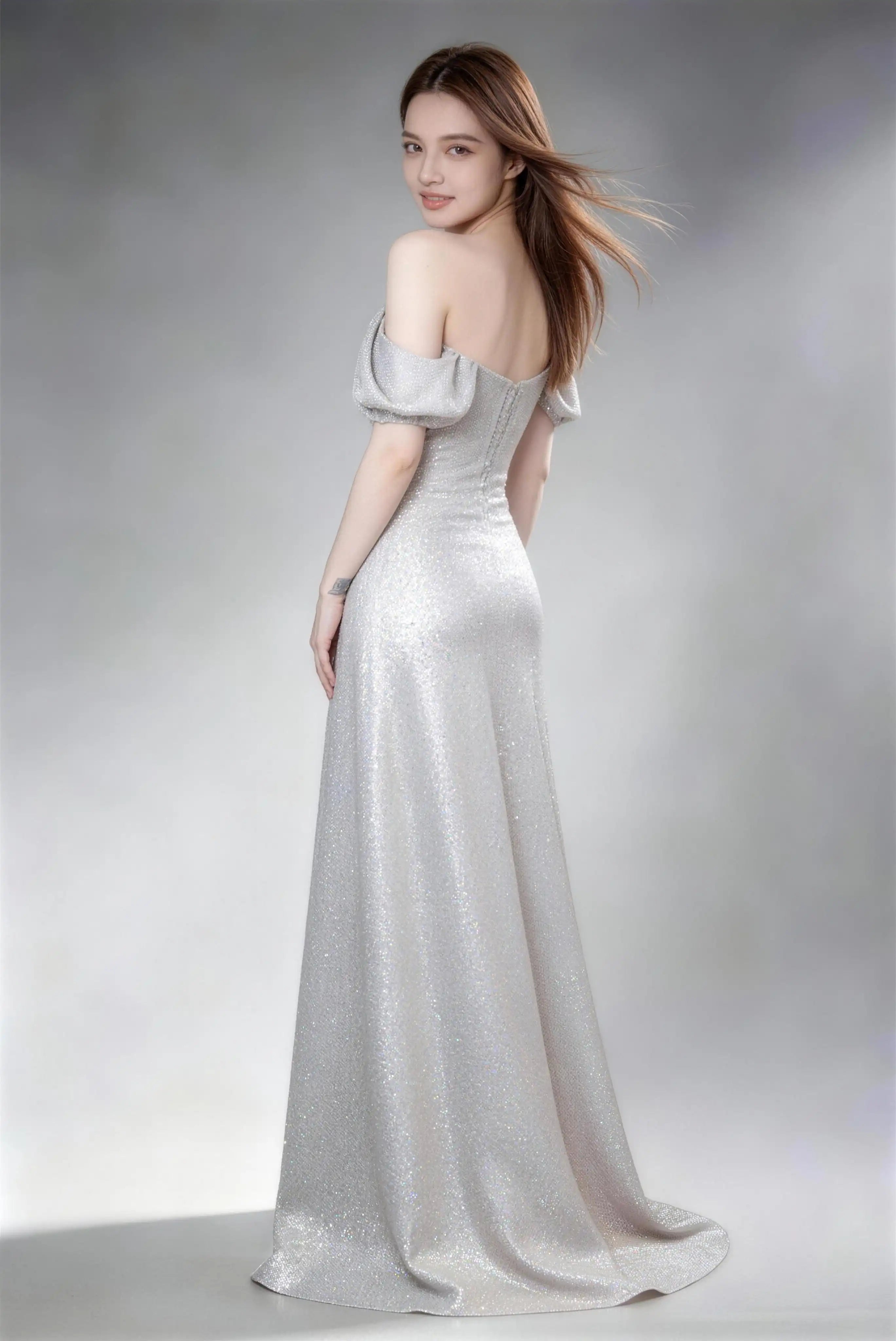 Phoehua Side Twirl View of Silver Glam Sparkly Evening Gown, Off‑Shoulder Puff‑Sleeve High‑Waist Corset Lace‑Up A‑Line Formal Wedding Guest Dress