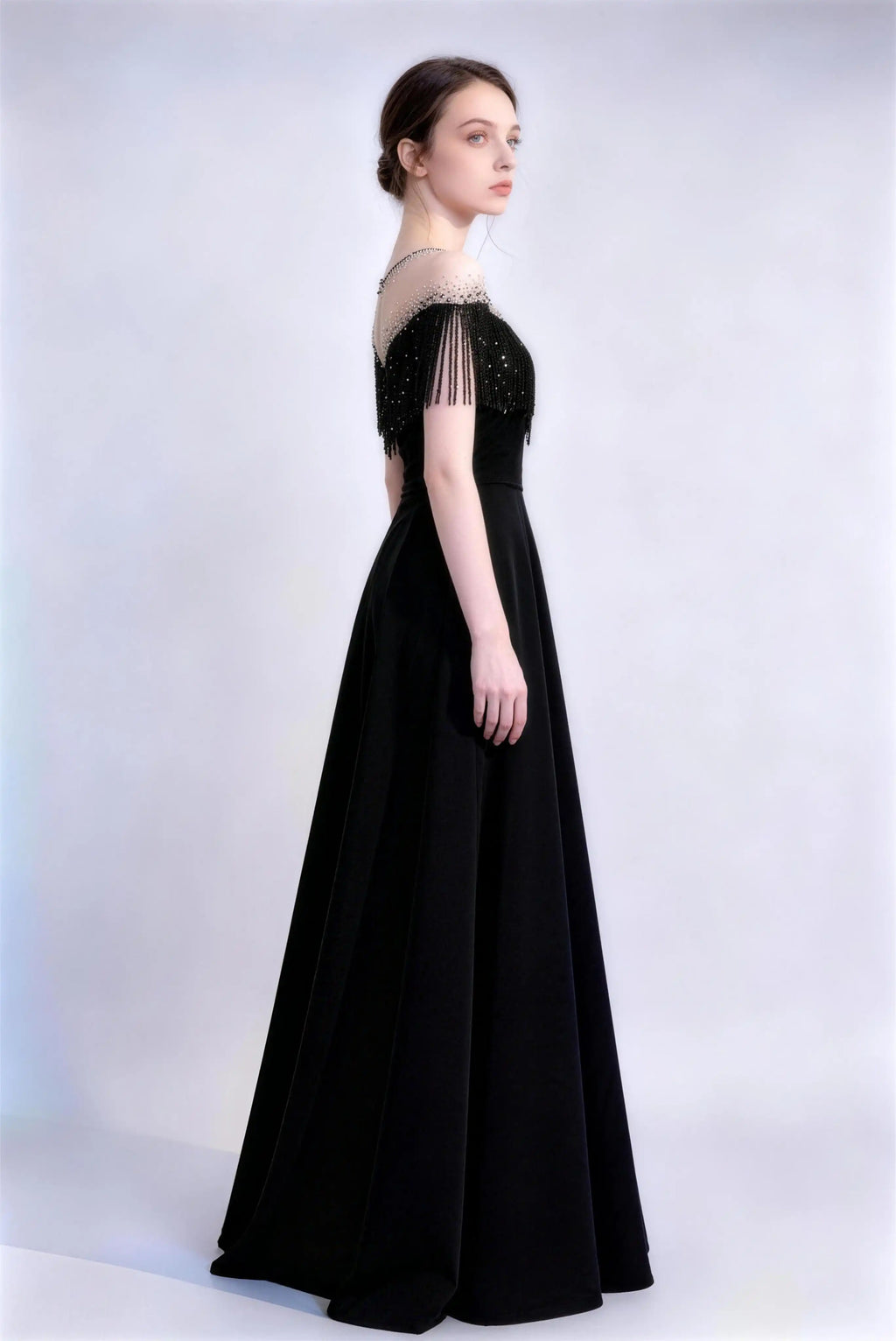 Phoehua Side View of Black Retro Glam Formal Evening Gown, Off‑Shoulder Beaded‑Fringe Sheer‑Neck High‑Waist Hollow‑Out Back A‑Line Long Dress