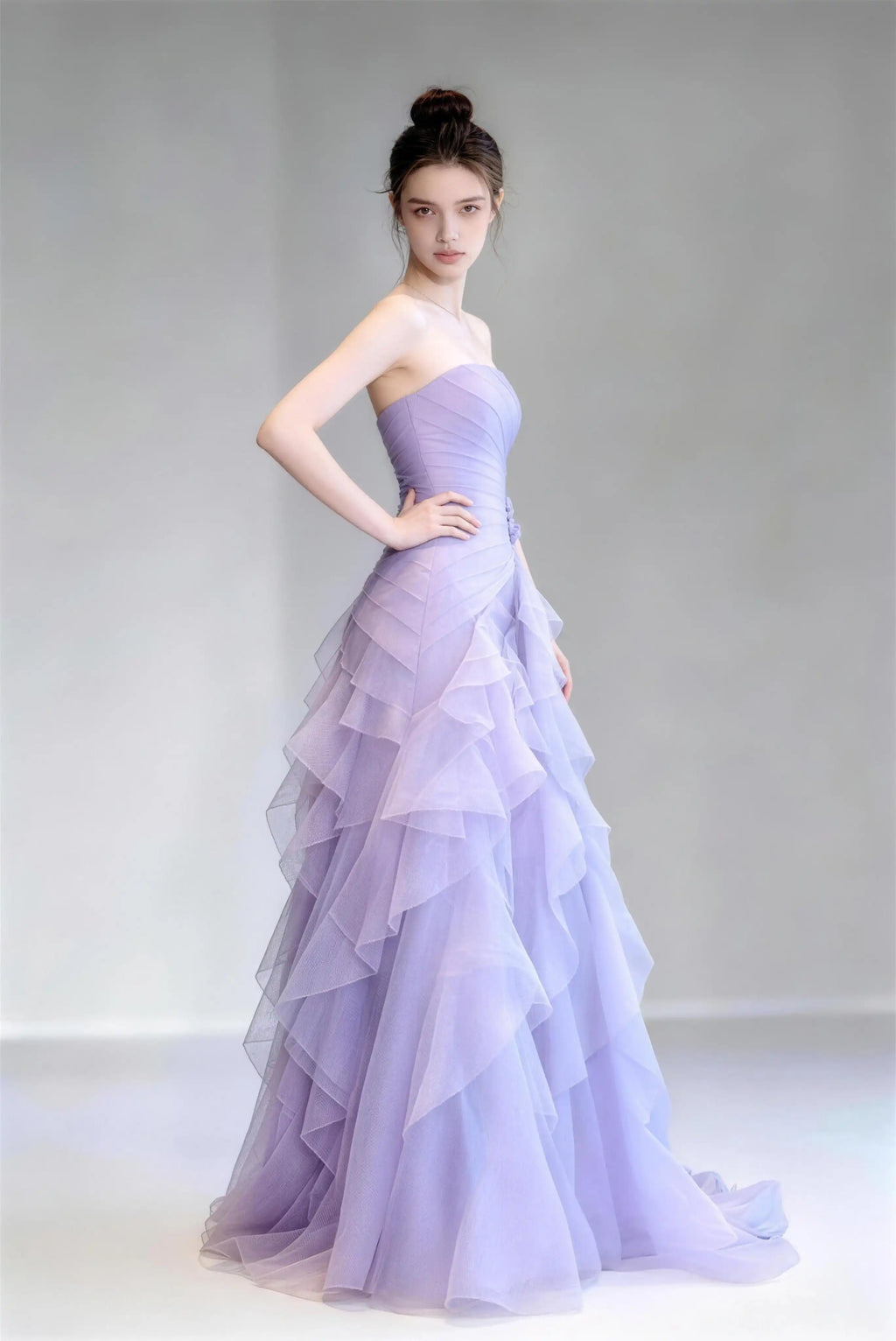Phoehua Front Pose of Light Purple Luxury Ethereal Formal Prom Gown, Strapless Ruched‑Bodice Lace‑Up‑Back Layered‑Ruffle Tulle Mermaid Wedding Guest Long Dress