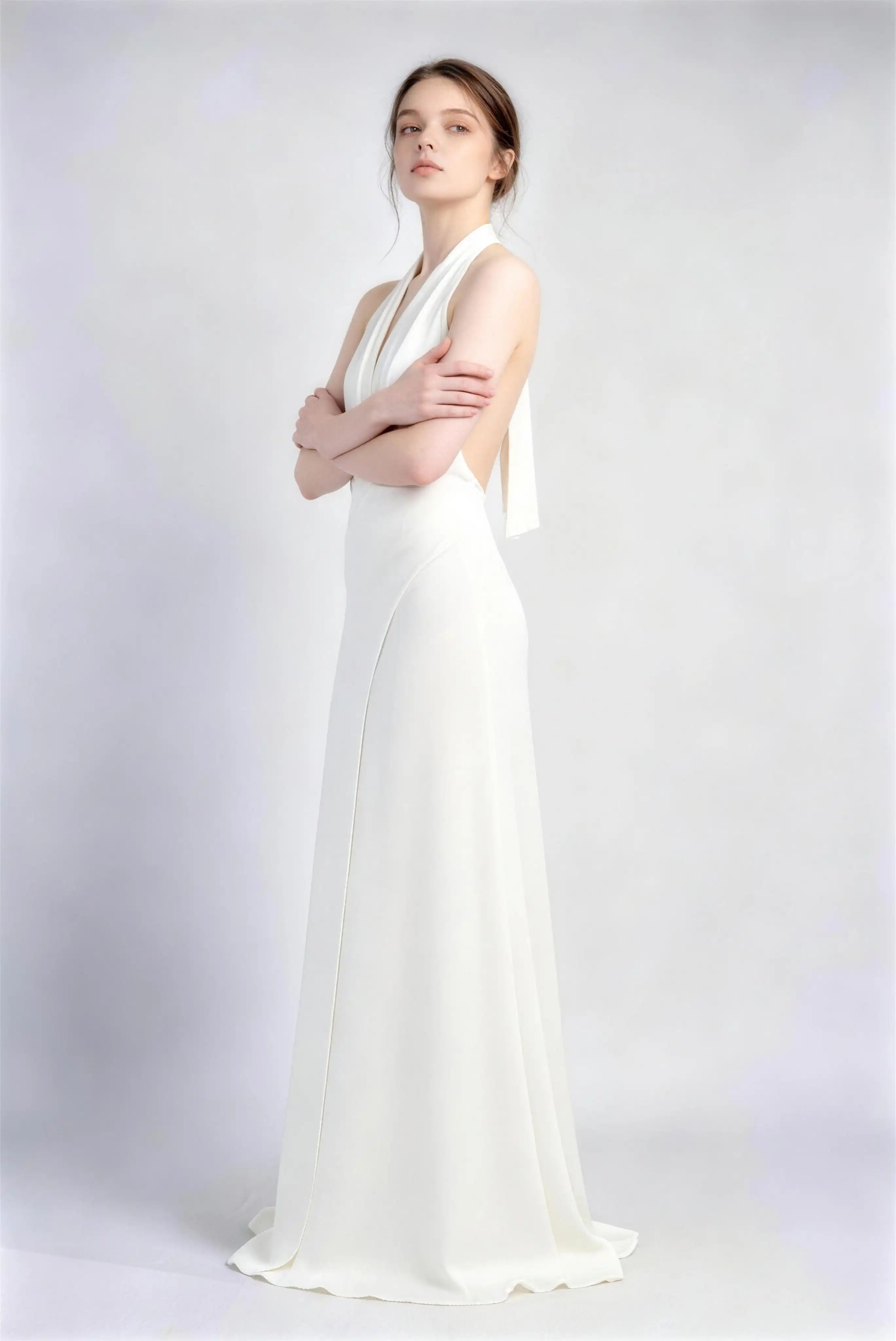 Phoehua Side Pose of White Luxury Formal Prom Dress, Halter Deep‑V‑Neck Open‑Back High‑Waist Satin A‑Line Maxi Bridesmaid Evening Gown