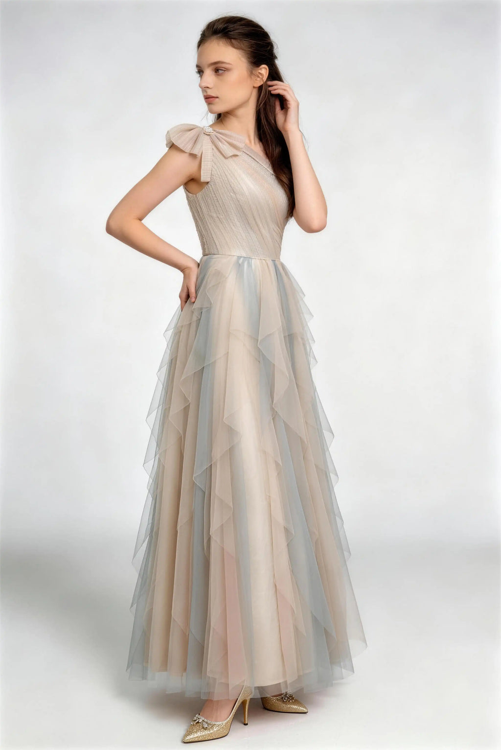 Phoehua Side Pose of Champagne‑Blue Fairy‑Core Formal Prom Dress, One‑Shoulder Bow Pleated‑Bodice Ombre‑Tulle Ruffle‑Layered Maxi Bridesmaid Evening Gown
