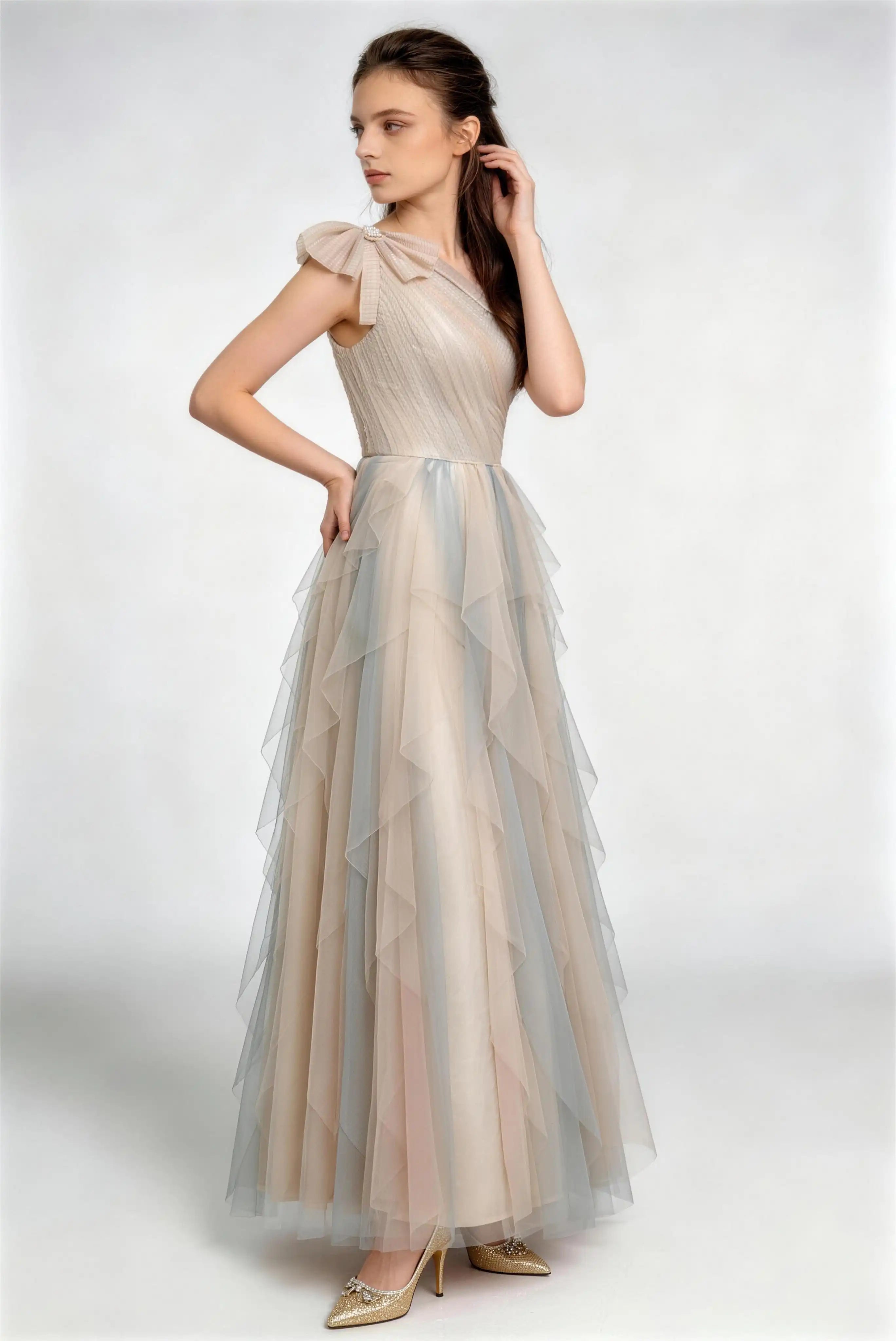 Phoehua Side Pose of Champagne‑Blue Fairy‑Core Formal Prom Dress, One‑Shoulder Bow Pleated‑Bodice Ombre‑Tulle Ruffle‑Layered Maxi Bridesmaid Evening Gown