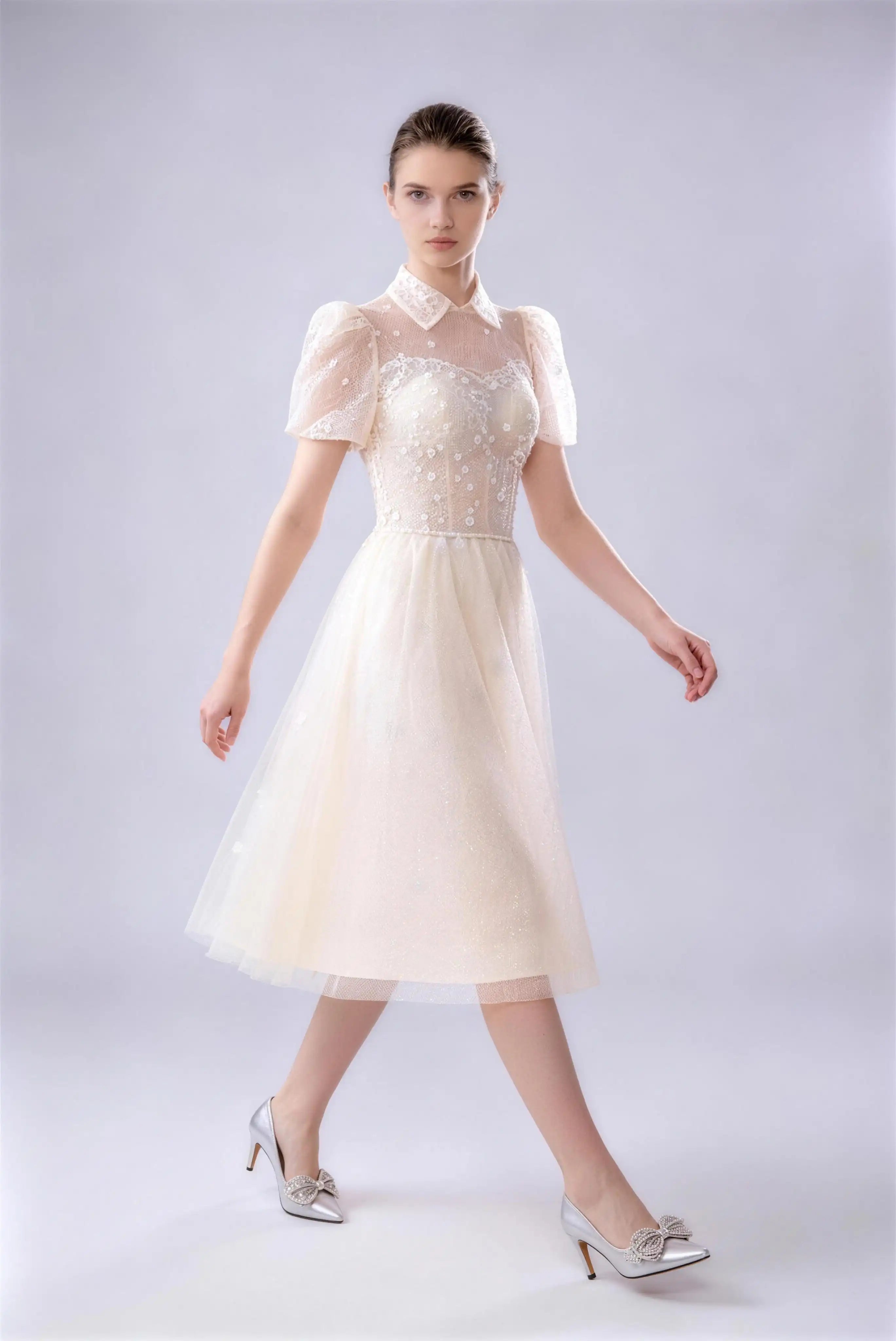 Phoehua Walking‑Pose View of Champagne Elegant Formal Evening Gown, Collared Puff‑Sleeve Tie‑Back Corset Beaded‑Floral High‑Waist A‑Line Wedding Guest Midi Dress