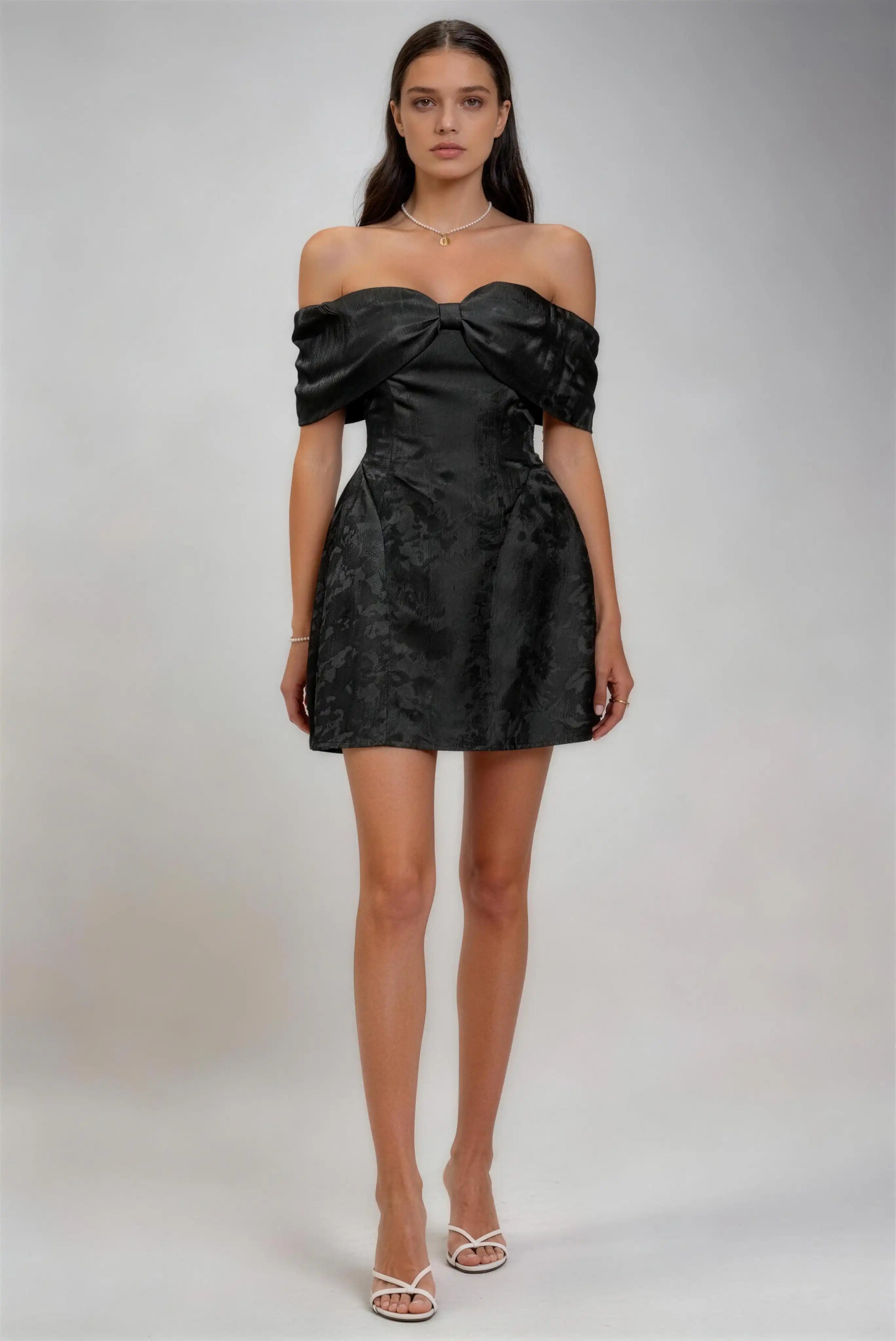 Phoehua Black Off‑The‑Shoulder Bow Jacquard Satin Mini Evening Dress, Front View High‑Waist Slim Fit A‑Line Ruffle Hem Sexy Celebrity Formal Cocktail Party Dress