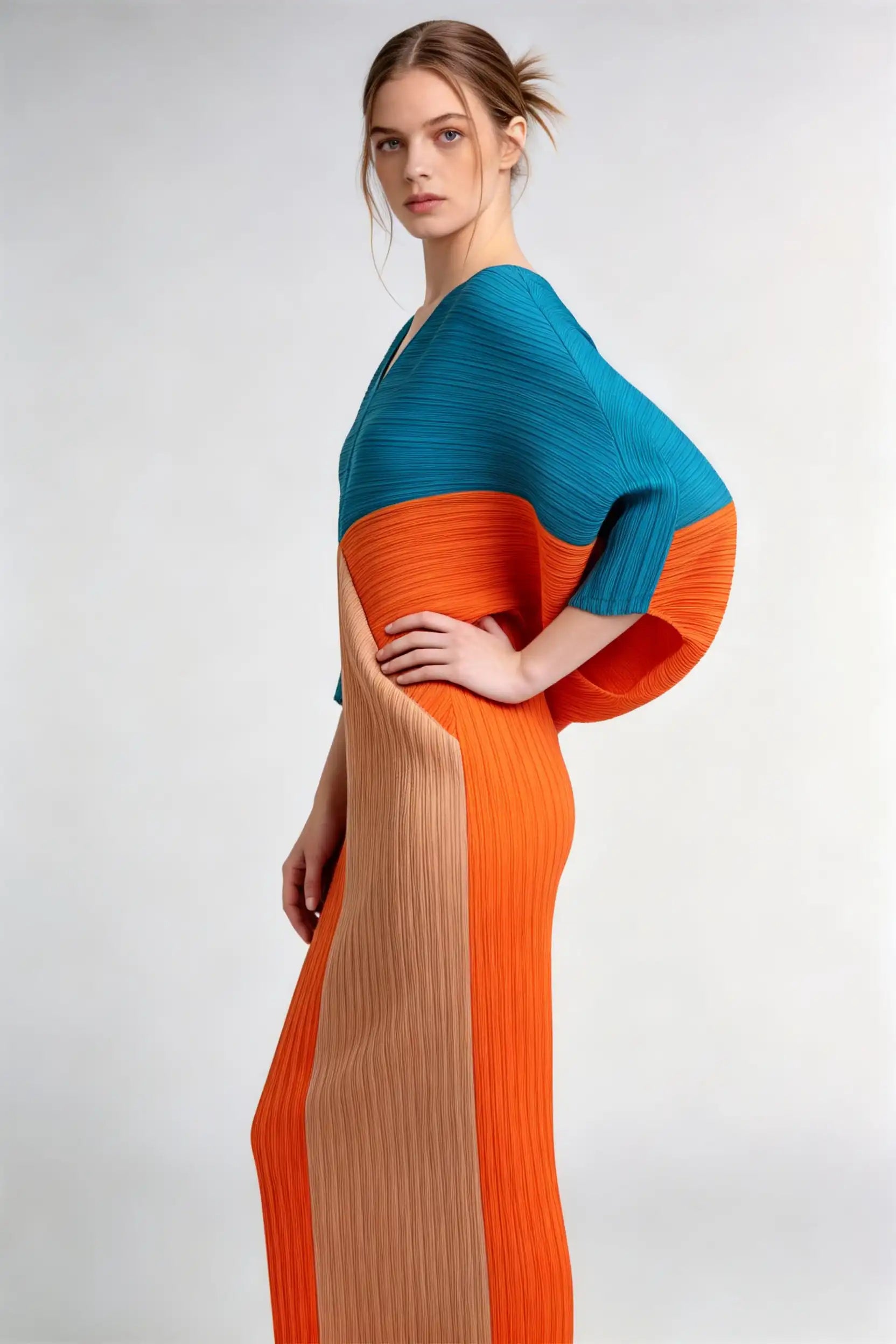 Phoehua Side Pose View of Artistic Geometric Color‑Block Pleated Dress, V‑Neck Batwing‑Sleeve High‑Waist Stretch‑Polyester Casual Party Midi Dress