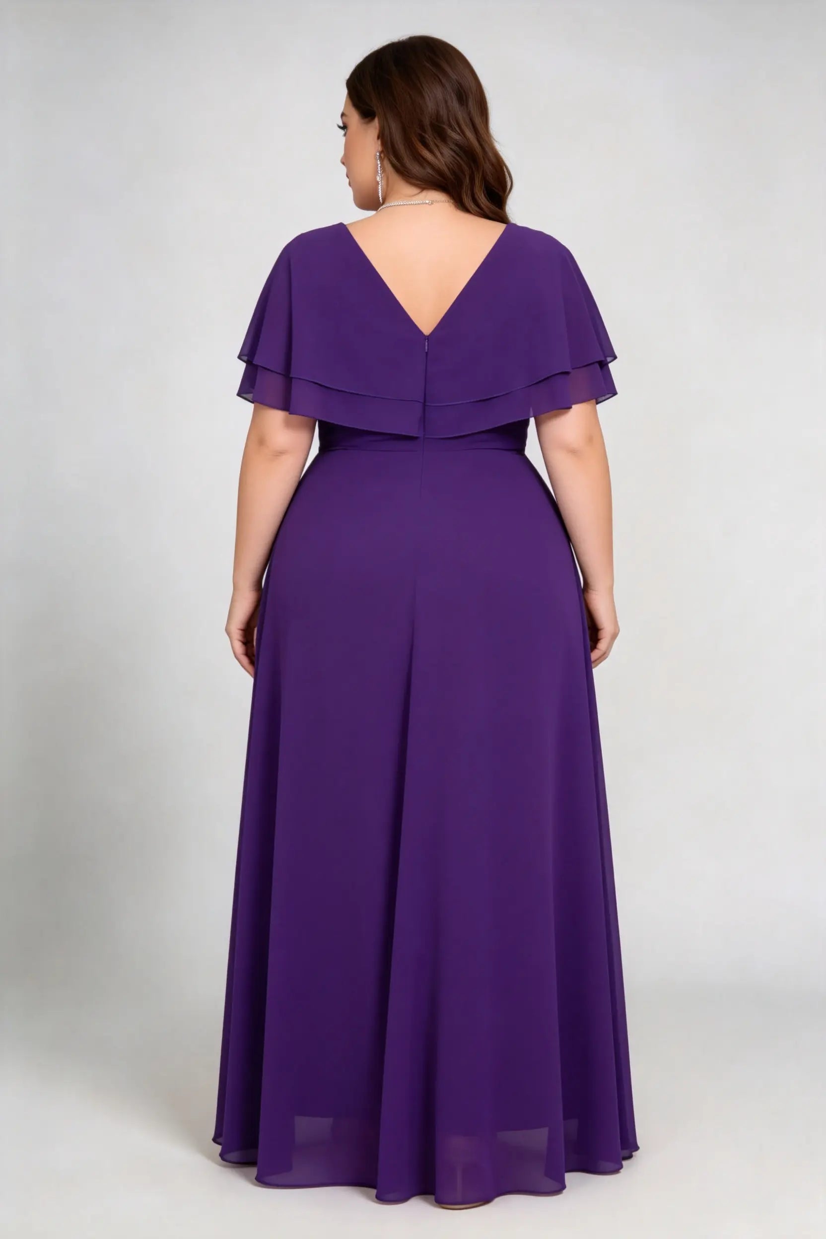 Back view of purple chiffon maxi dress with open back and ruffled sleeves, plus size fit