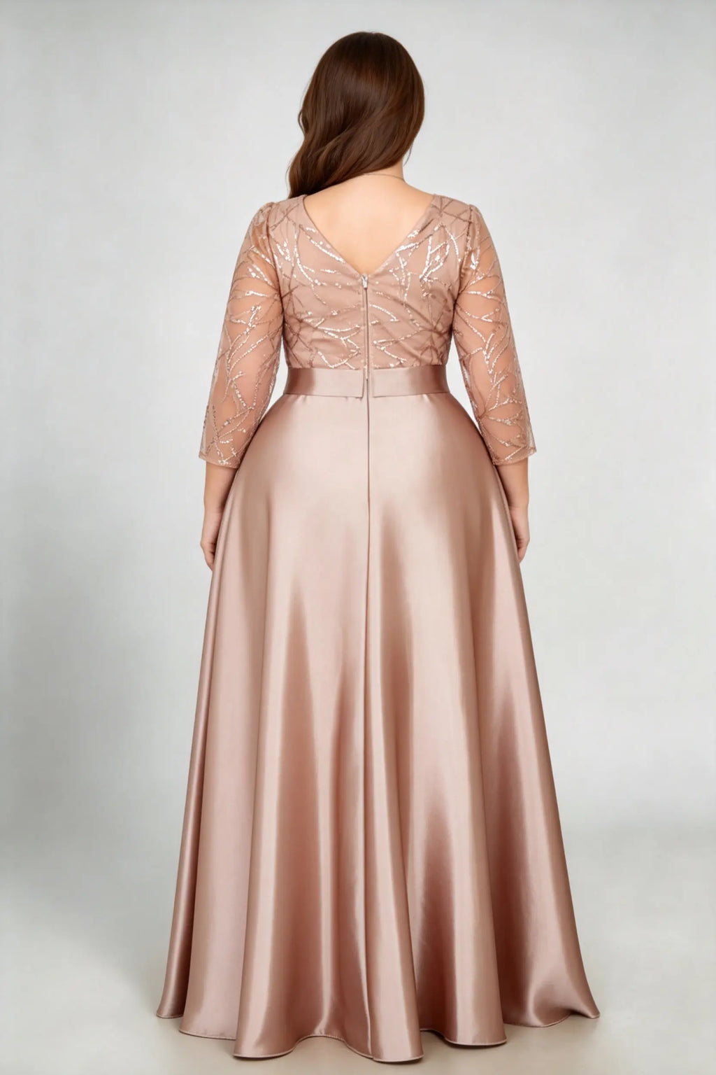 Curvy model wearing plus size sequin mesh boat neck evening gown - elegant rose gold satin a-line maxi dress