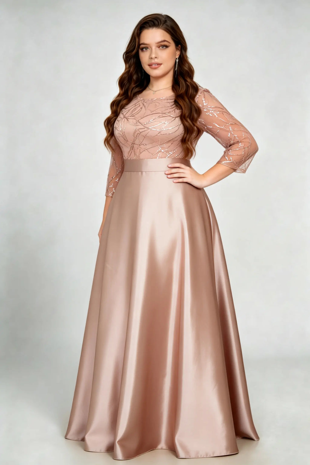 Curvy model wearing plus size sequin mesh boat neck evening gown - elegant rose gold satin a-line maxi dress