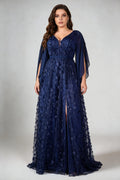 Curvy model wearing plus size navy blue 3d floral applique evening gown – elegant v-neck cape sleeve formal maxi dress with slit (xl-4xl)