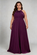Curvy model wearing plus size burgundy dark plum halter neck evening gown – elegant pleated chiffon a-line formal maxi dress