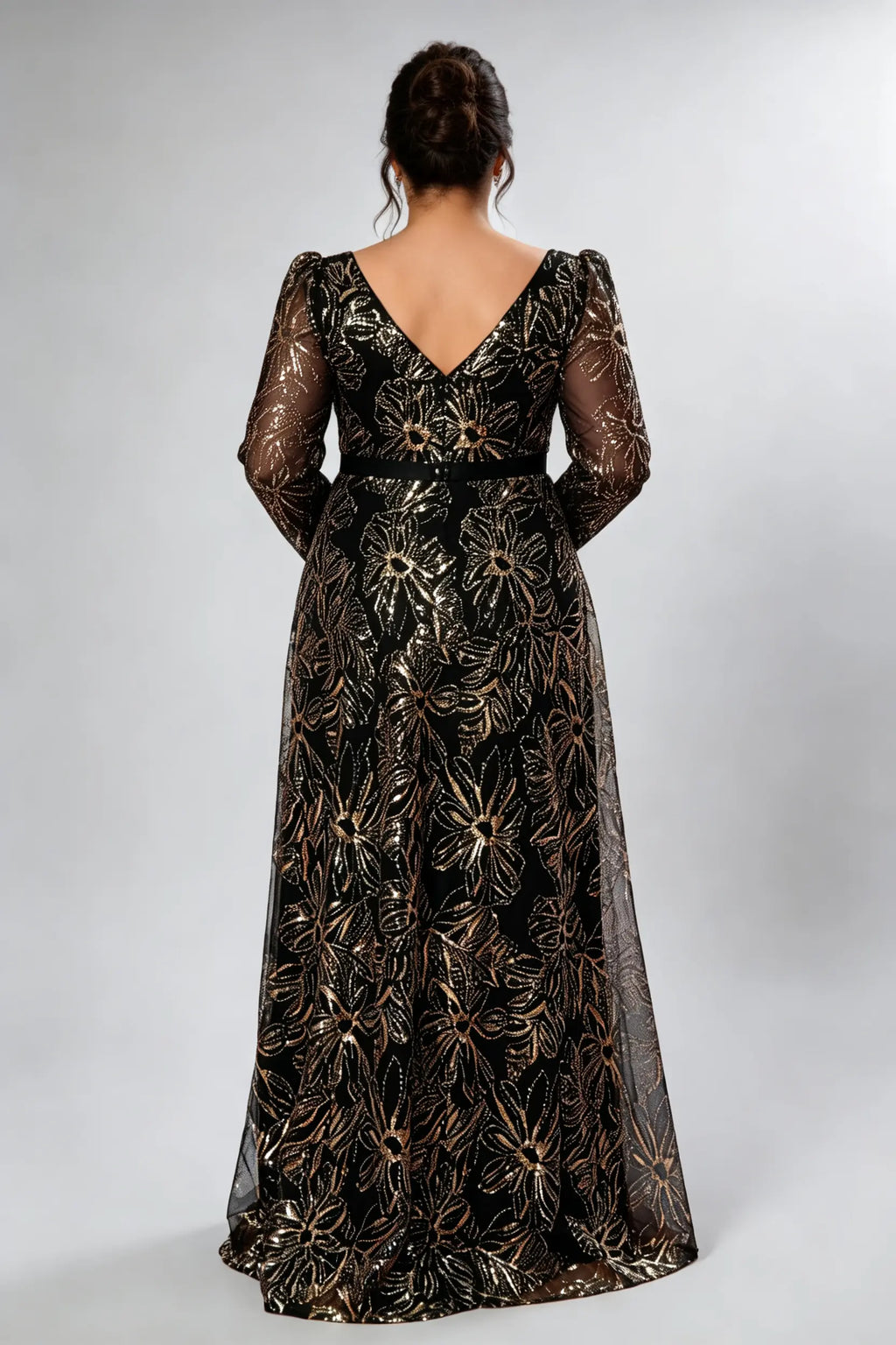 Curvy model wearing plus size black gold sequin floral evening gown - elegant square neck long sleeve a-line maxi prom dress