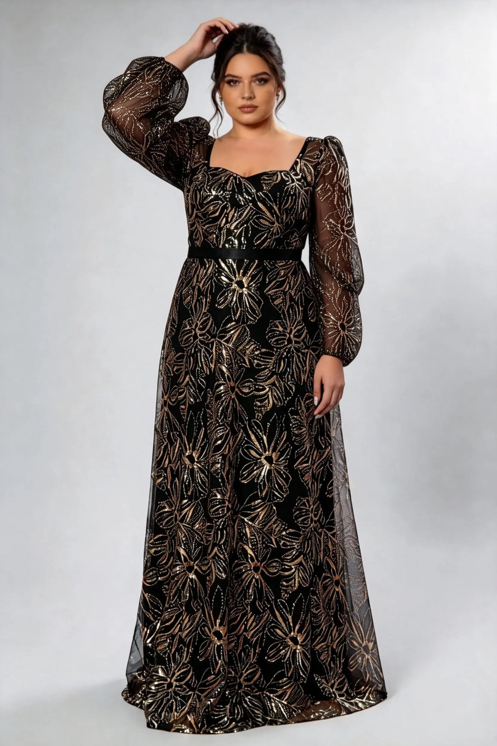 Curvy model wearing plus size black gold sequin floral evening gown - elegant square neck long sleeve a-line maxi prom dress