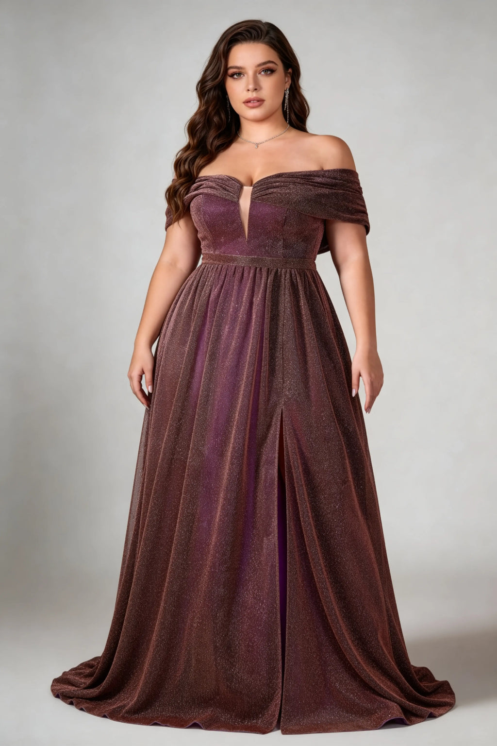 Curvy model wearing plus size brown shimmering off-the-shoulder evening gown – elegant metallic v-neck high slit formal maxi dress