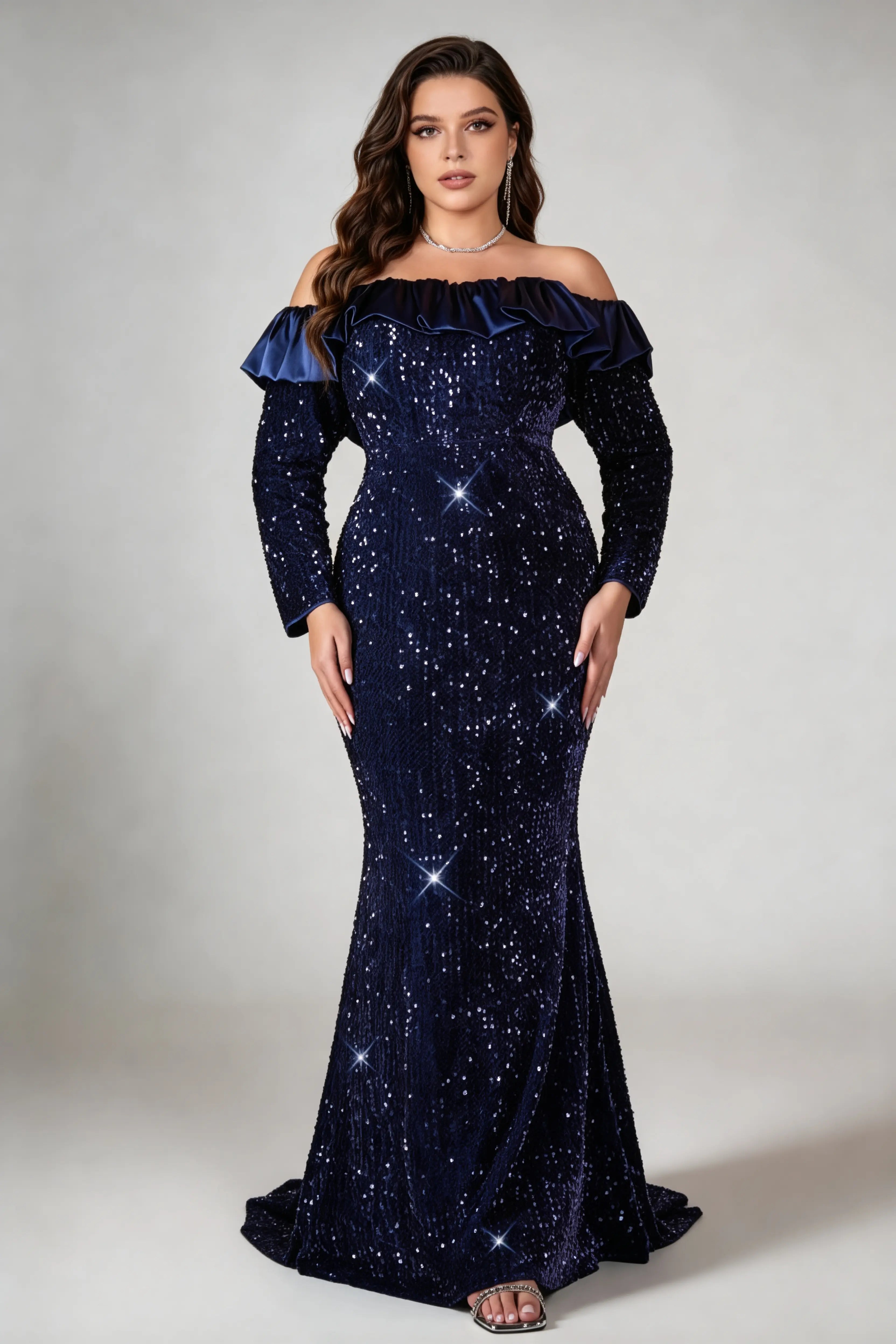 Curvy model wearing plus size navy off-the-shoulder sequin mermaid evening gown - elegant ruffle trim maxi dress