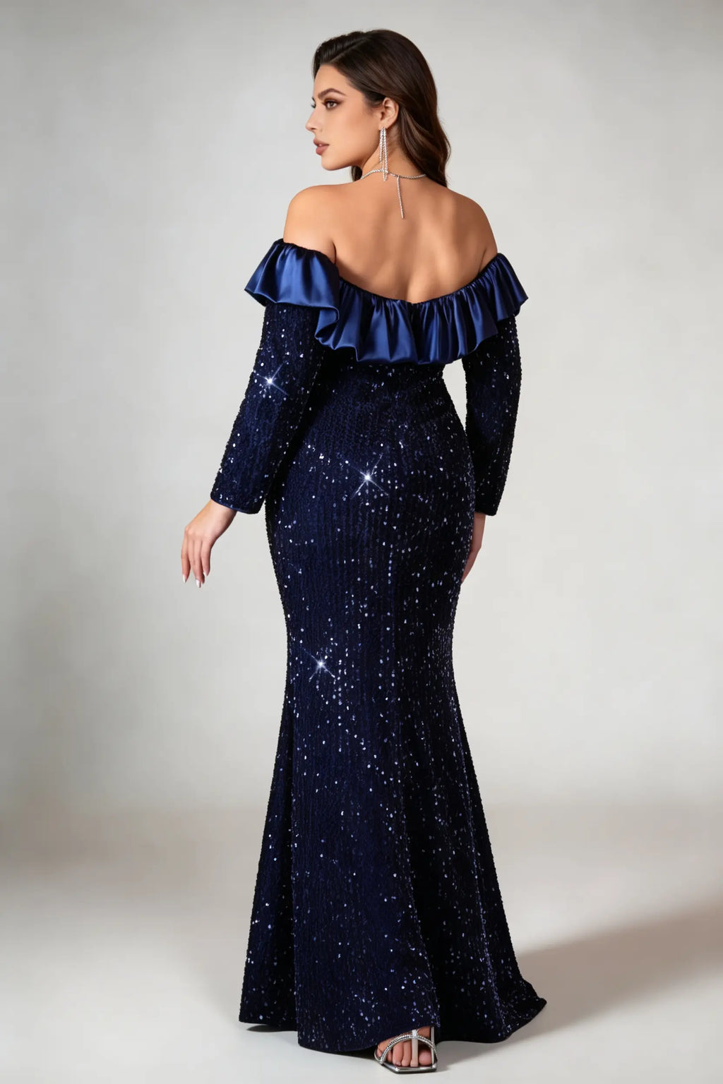 Curvy model wearing plus size navy off-the-shoulder sequin mermaid evening gown - elegant ruffle trim maxi dress