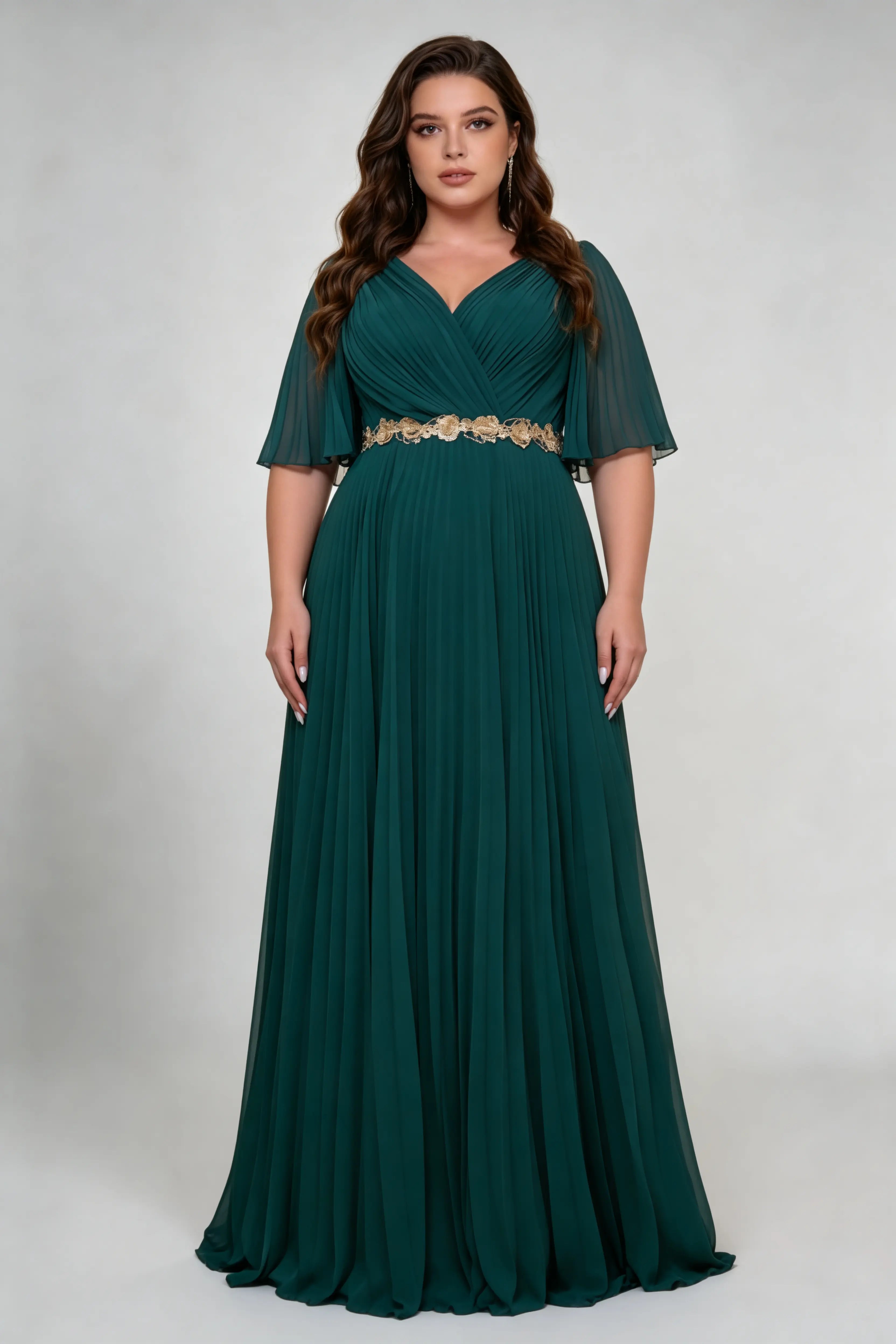 Curvy model wearing plus size dark-green v-neck pleated chiffon evening maxi dress - elegant gold embroidery waist emerald green gown