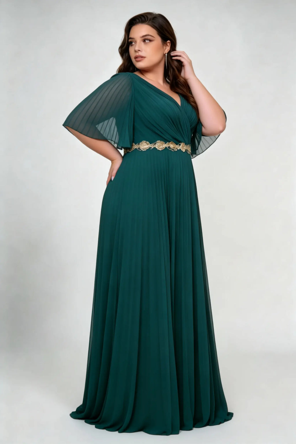 Curvy model wearing plus size dark-green v-neck pleated chiffon evening maxi dress - elegant gold embroidery waist emerald green gown