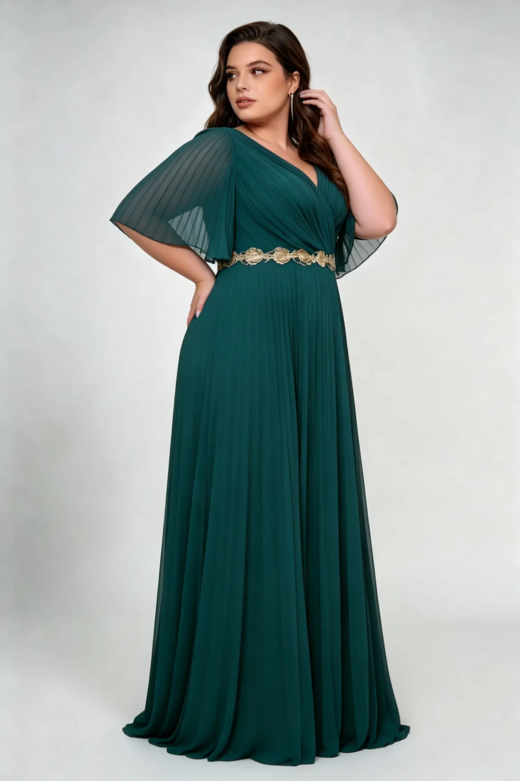 Curvy model wearing plus size dark-green v-neck pleated chiffon evening maxi dress - elegant gold embroidery waist emerald green gown
