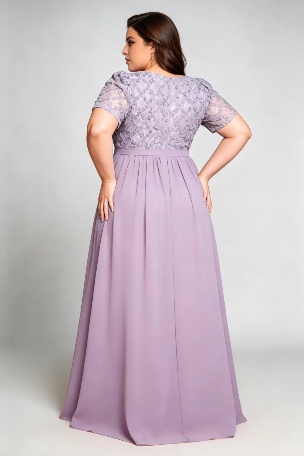 Curvy model wearing plus size purple v-neck floral lace evening gown - elegant short sleeve high-waist chiffon maxi dress