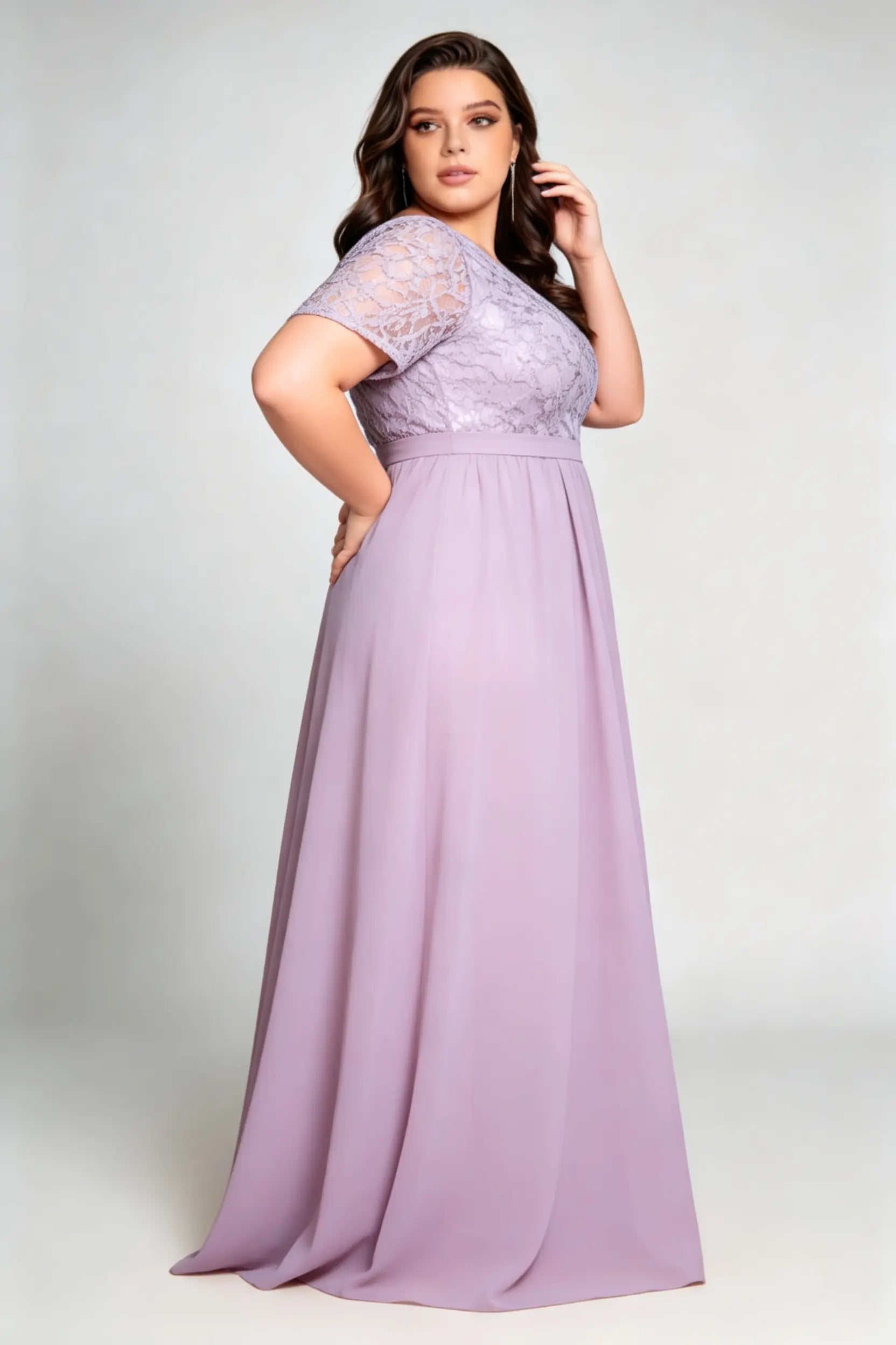 Curvy model wearing plus size purple v-neck floral lace evening gown - elegant short sleeve high-waist chiffon maxi dress