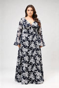 Curvy model wearing plus size navy blue lace floral evening gown - elegant deep v-neck long bell sleeve a-line maxi dress