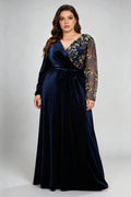 Curvy model wearing plus size asymmetrical gold embroidered navy blue velvet evening maxi dress