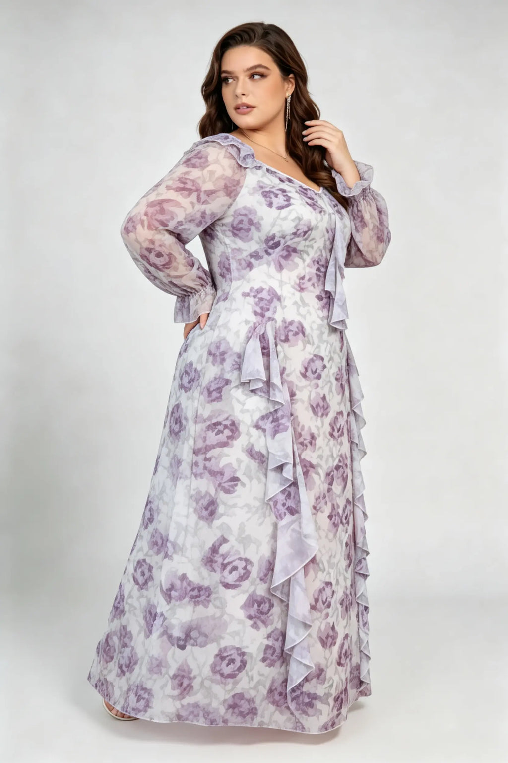 Curvy model wearing plus size cream v-neck long sleeves romantic purple floral ruffle maxi dress