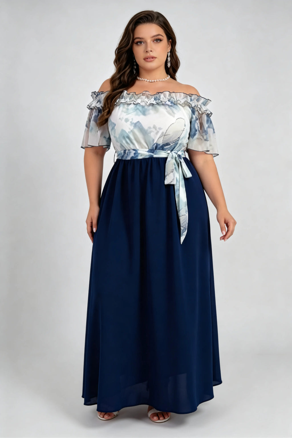 Curvy model wearing plus size navy off-the-shoulder ink wash mock two-piece maxi dress